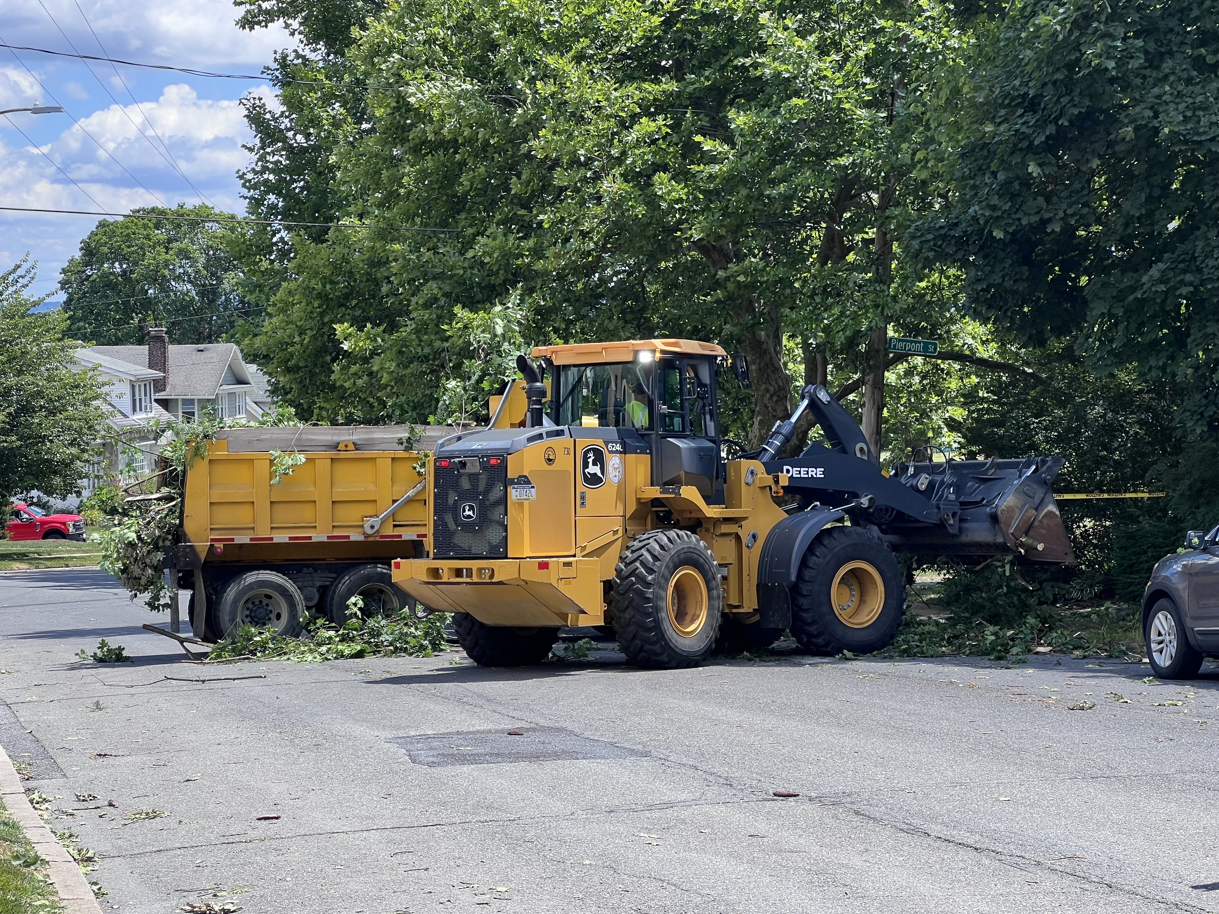 Clean up continues Thursday, June 27, 2024, on Beverly Avenue in Bethlehem after a severe thunderstorm with nearly 60 mph wind gusts ripped through the Lehigh Valley the night before. (Rich Rolen/Special to The Morning Call)