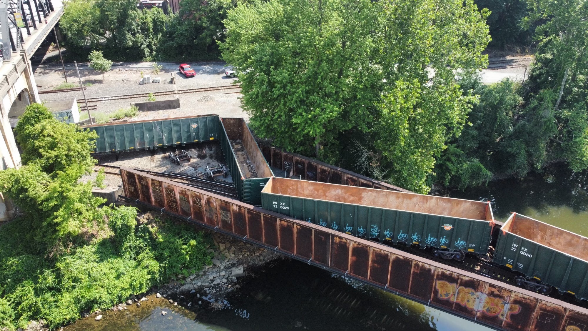 Multiple train-cars derail Friday, July 5, 2024 under the Hill to Hill Bridge in Bethlehem.(Rich Rolen/Special to The Morning Call)