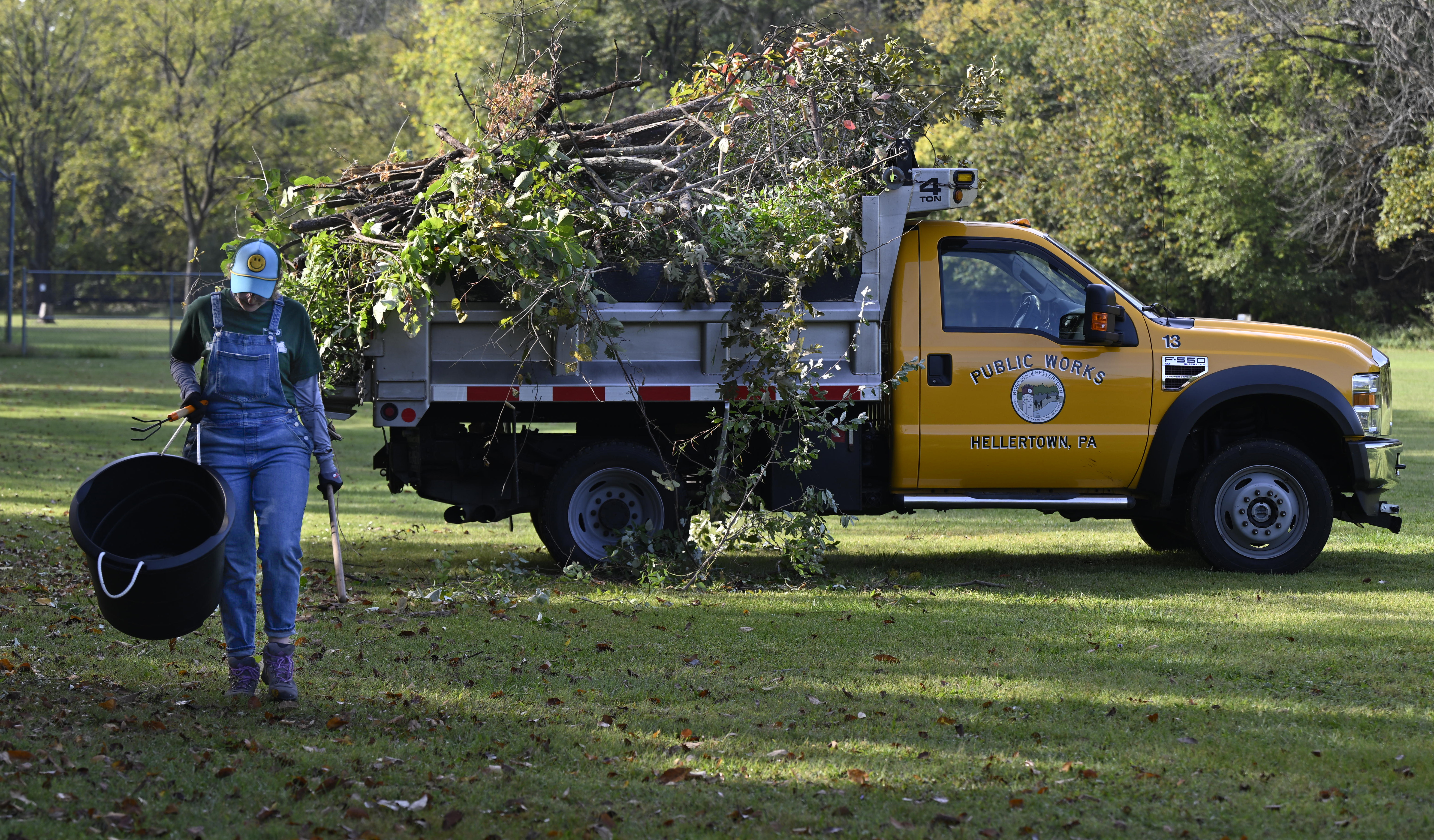 Erica Golaszewski of Bethlehem, an employee of C.F. Martin & Co., volunteers to landscape Thursday, Sept. 19, 2024, at the Hellertown Historical Society property on Walnut Street in Hellertown. Approximately 2,300 volunteers from 54 area businesses completed community service projects at dozens of nonprofits throughout Lehigh and Northampton counties during the annual Day of Caring, organized by the United Way of the Greater Lehigh Valley. (Monica Cabrera/The Morning Call)