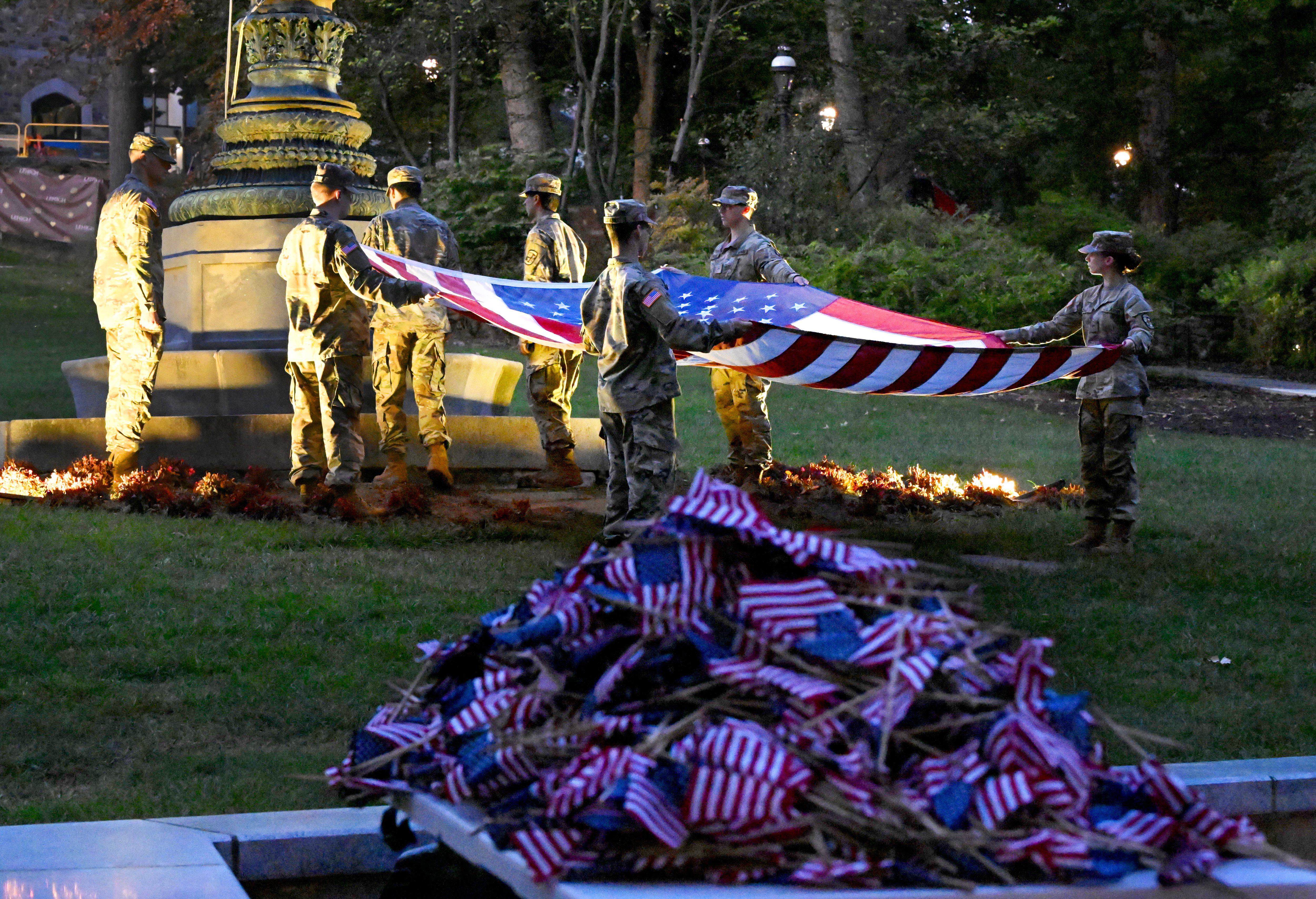 Lehigh University and the Steel Battalion Army ROTC Program holds its annual 9/11 memorial event Wednesday, Sept. 11, 2024, to mark the 23rd anniversary of the terror attacks. The ceremony included a flag raising, moment of silence and the planting of the 2,977 American flags to honor the lives lost. (Monica Cabrera/The Morning Call)