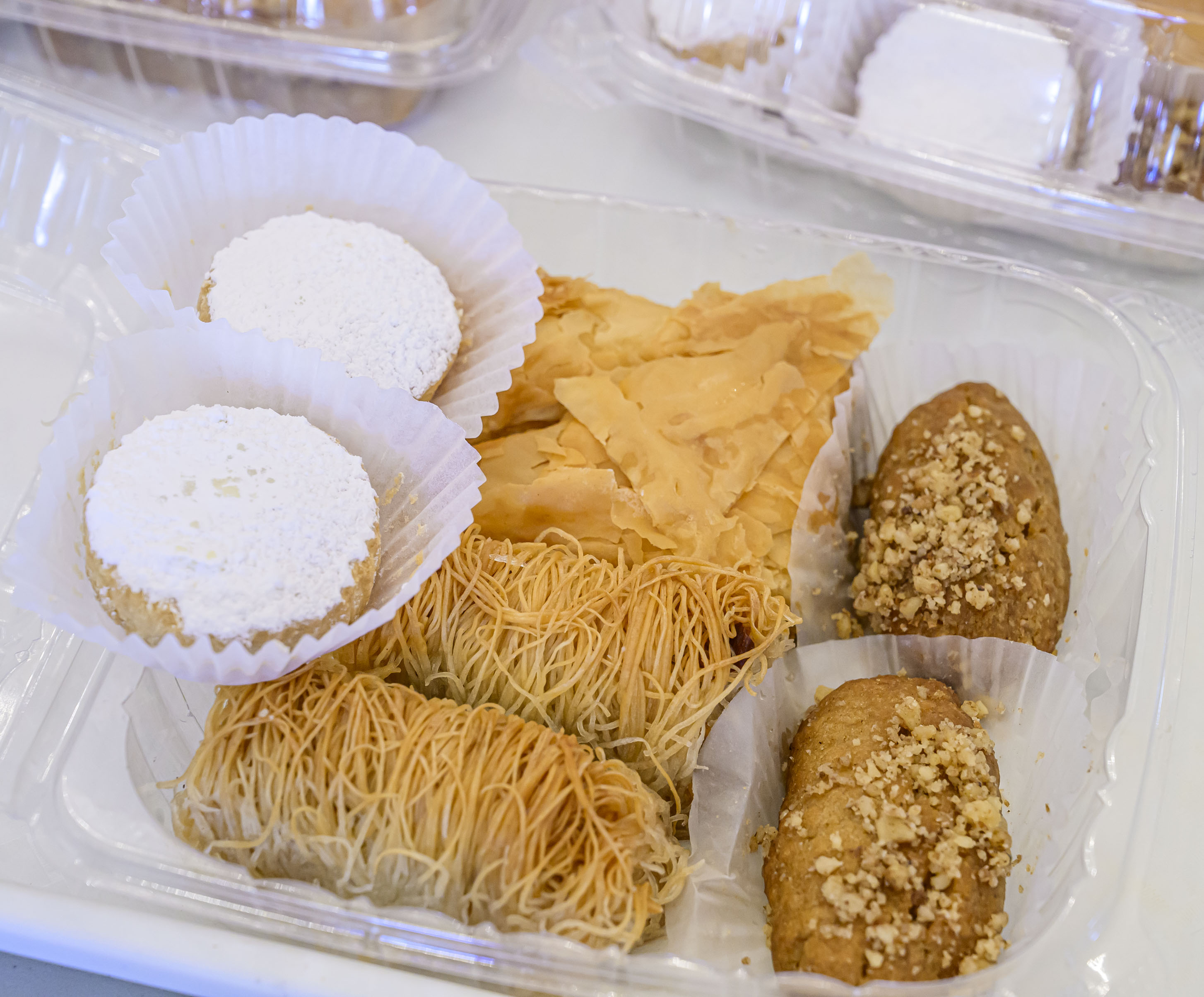 A dessert sampler features homemade baklava, nut rolls, kourambiedes, finikia and kataifi Thursday, Sept. 19, 2024, at the St. Nicholas Greek Orthodox Cathedral's Greek Food Festival in Bethlehem. The festival runs through Sept. 22 and features music, Greek dancing, and Greek food such as gyros, souvlaki, spanakopita and desserts including baklava and kataifi.(April Gamiz/The Morning Call)