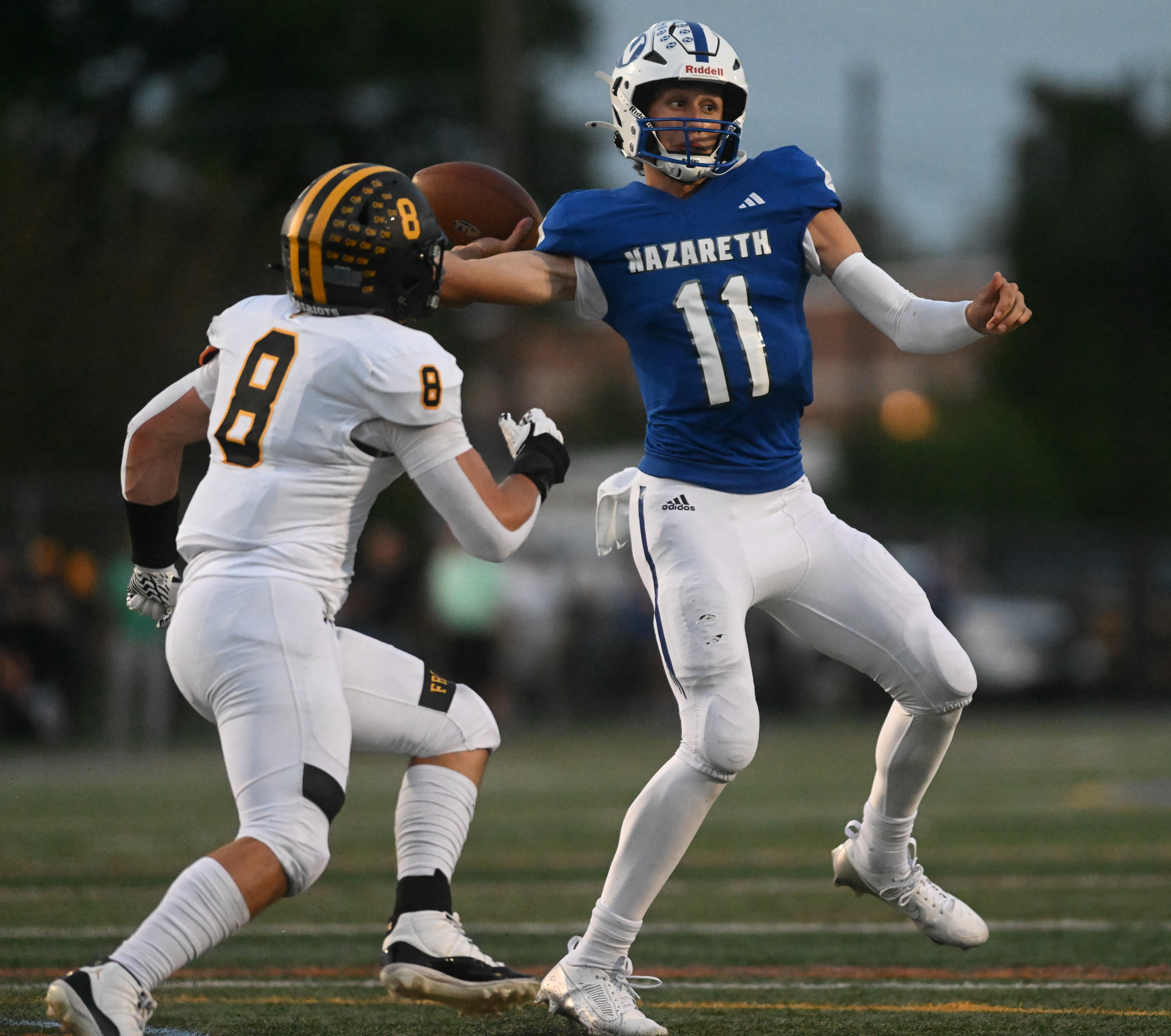 Nazareth's Peyton Falzone passes the ball Friday, Sept. 13, 2024, against Freedom at Nazareth High School.(Amy Shortell/The Morning Call)