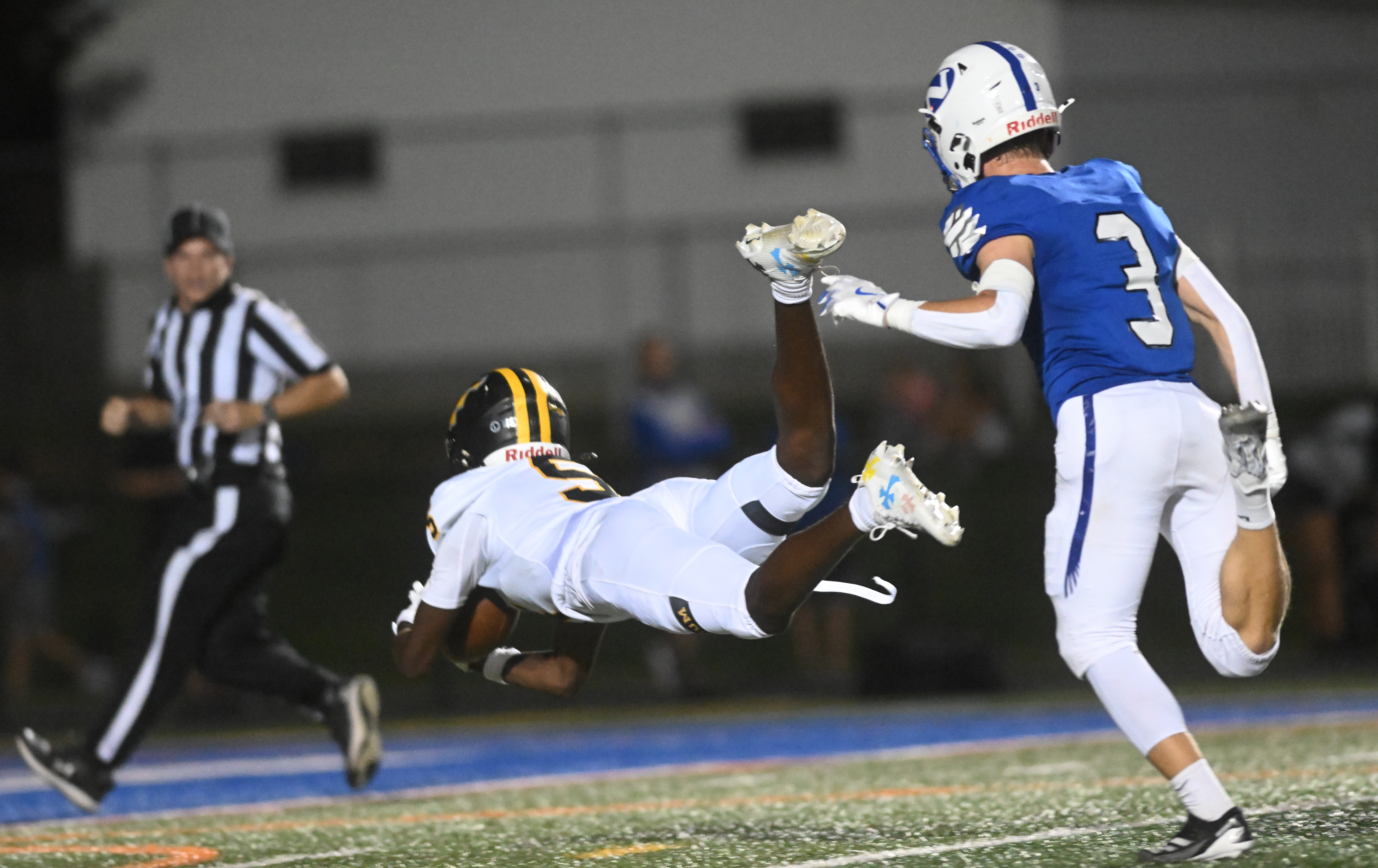 Freedom's Shacre Colwell leaps for the end zone only to come up short against Nazareth Friday, Sept. 13, 2024, at Nazareth High School.(Amy Shortell/The Morning Call)