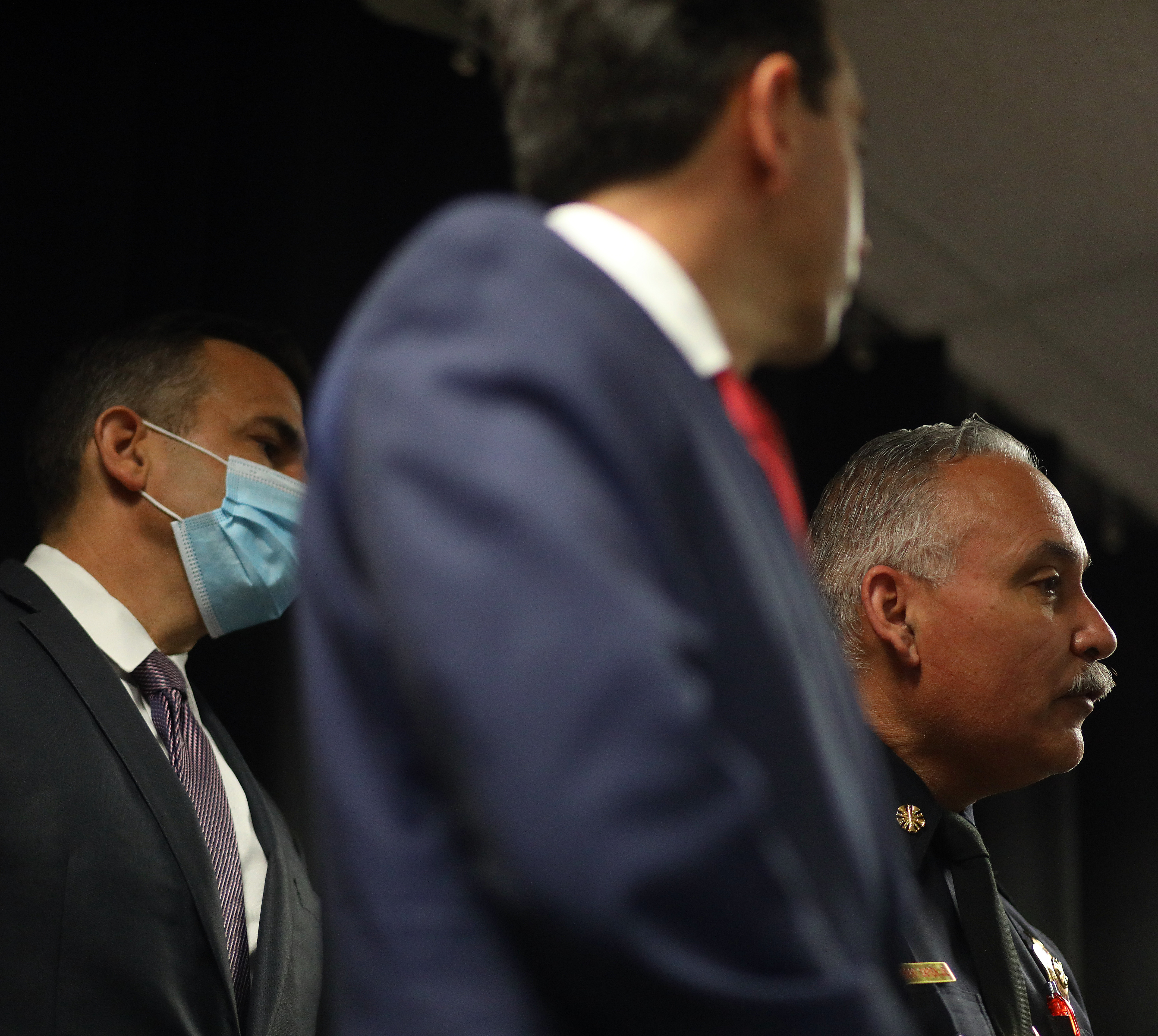 San Jose Fire Chief Robert Sapien, right, takes part in a press conference announcing Dyllin Jaycruz Gogue has been charged with felony arson and other charges on Tuesday, April 19, 2022, in San Jose, Calif. Gogue is alleged to have set fire to a Home Depot store on Blossom Hill Road while trying to steal tools.