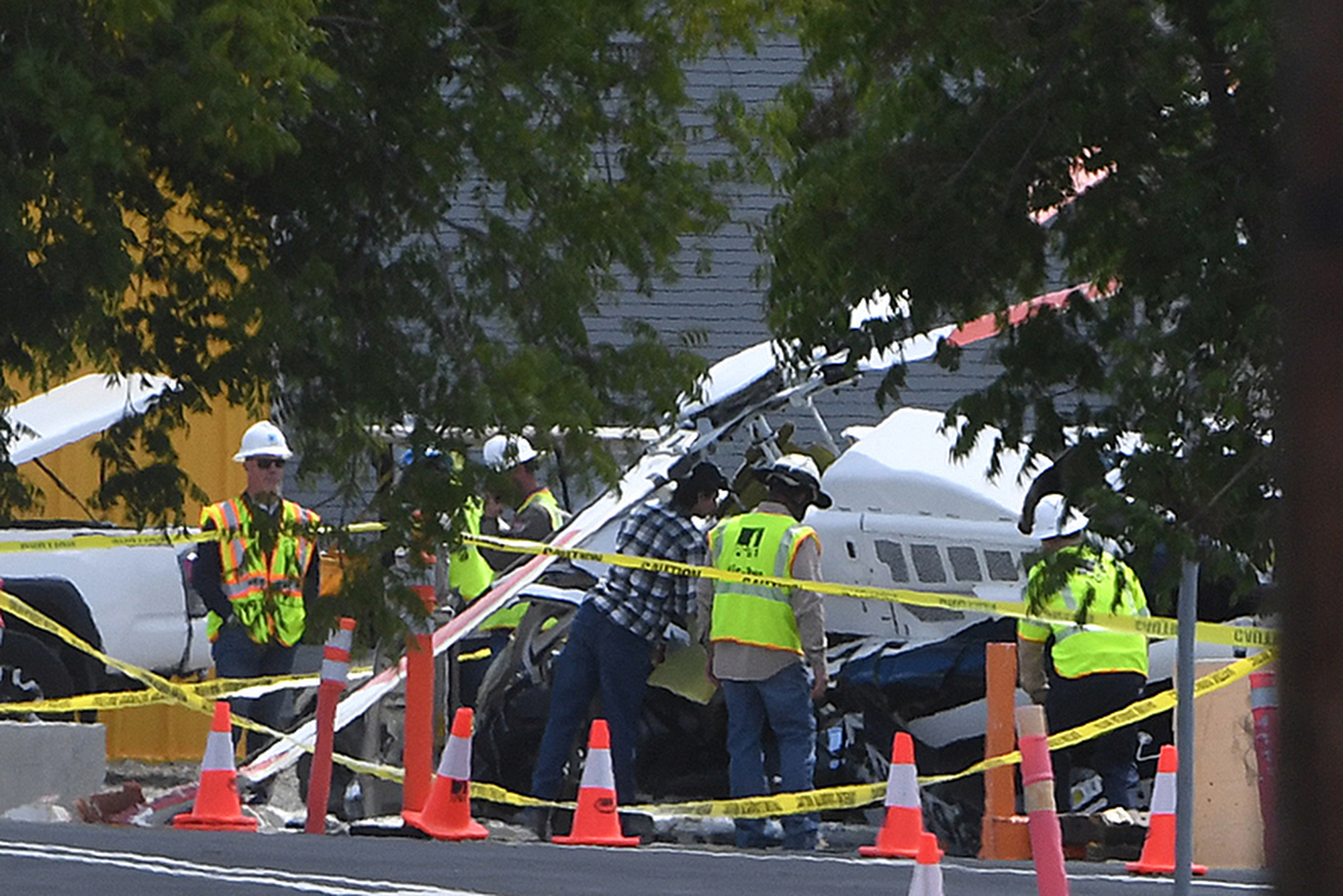 LIVERMORE, CA - MAY 11: A Pacific Gas & Electric helicopter crashed at a training facility on National Drive in Livermore, Calif., on Wednesday, May 11, 2022. Two men were injured in the crash and are expected to survive, according to the Livermore Police Department. (Doug Duran/Bay Area News Group)
