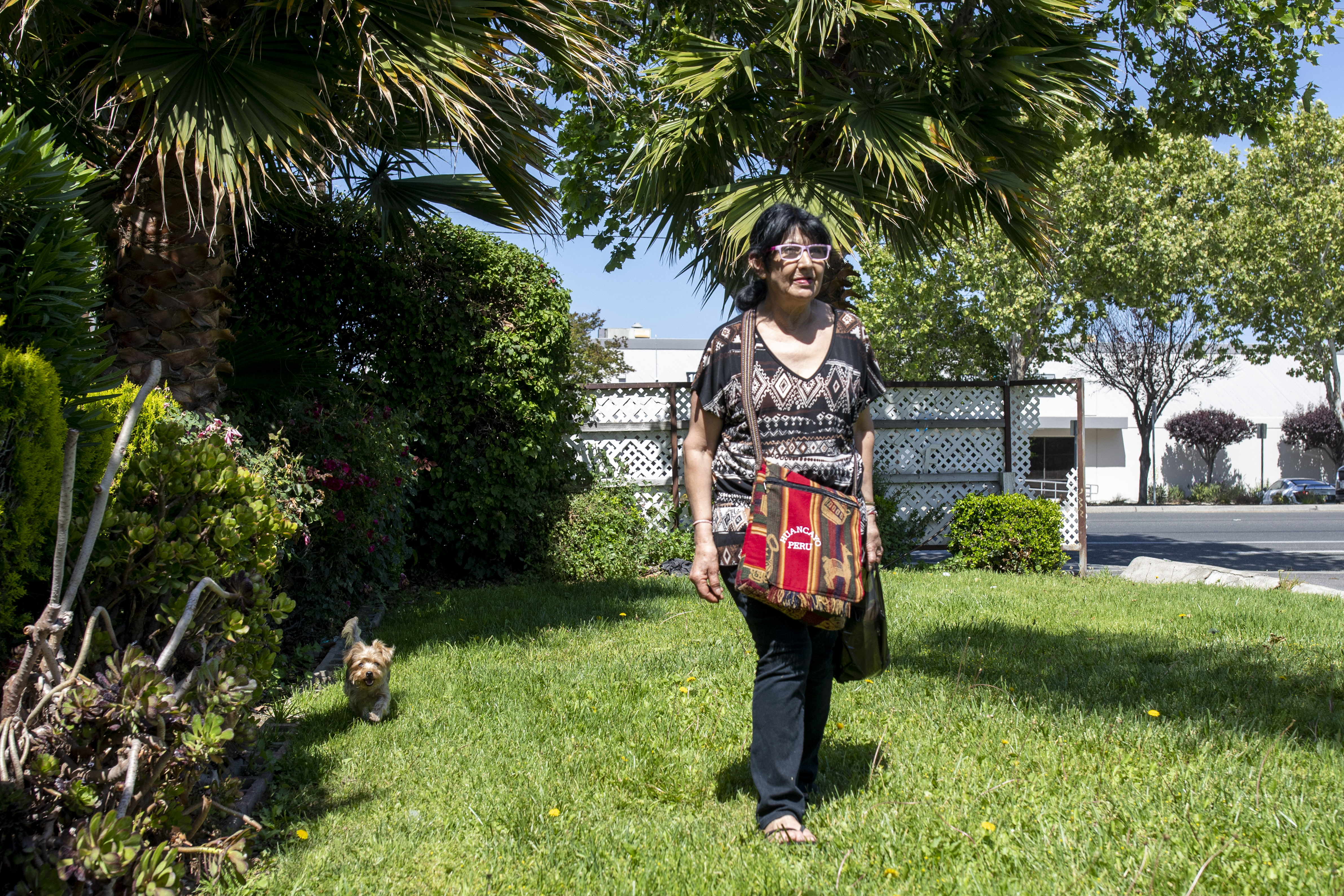 Bertha Iglesias with her dog Ultima