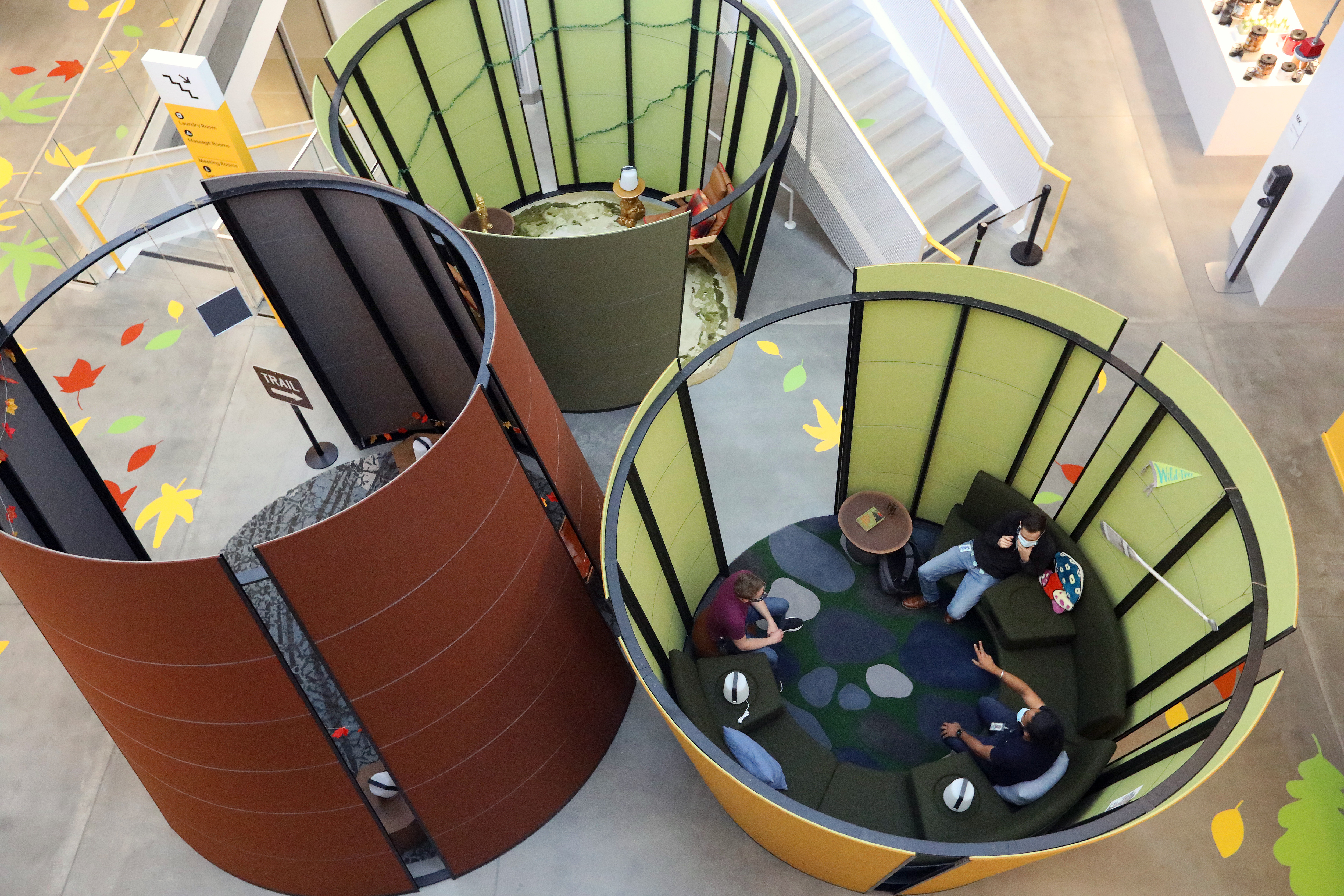 Google employees meet in a gathering space at the new Bay View campus on Monday, May 16, 2022, in Mountain View, Calif. The 42 acres campus totals 1.1 million square feet, with two office buildings, an event center, and 20 acres of open space. (Aric Crabb/Bay Area News Group)
