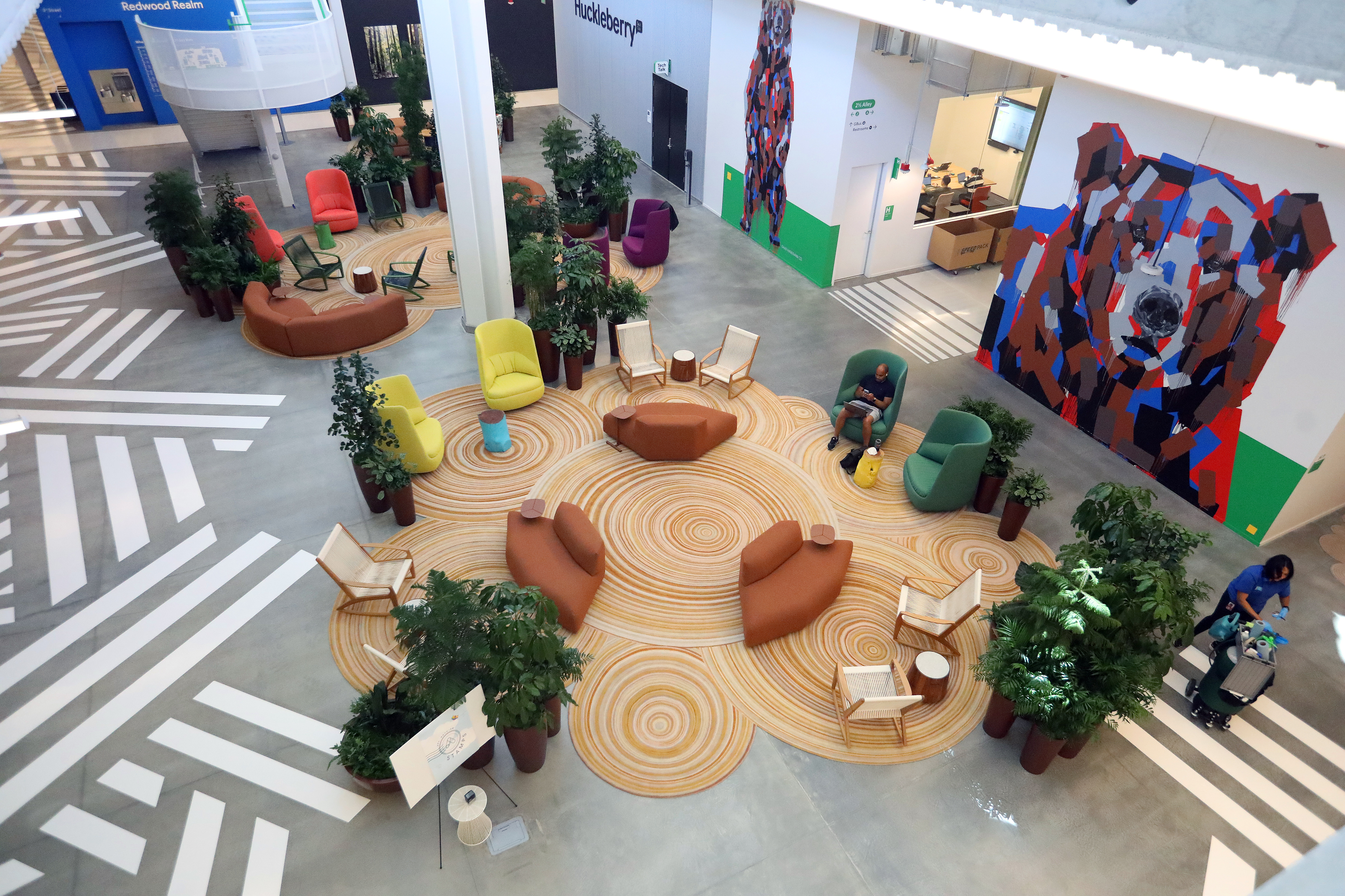 A Google employee in a gathering space at the new Bay View campus