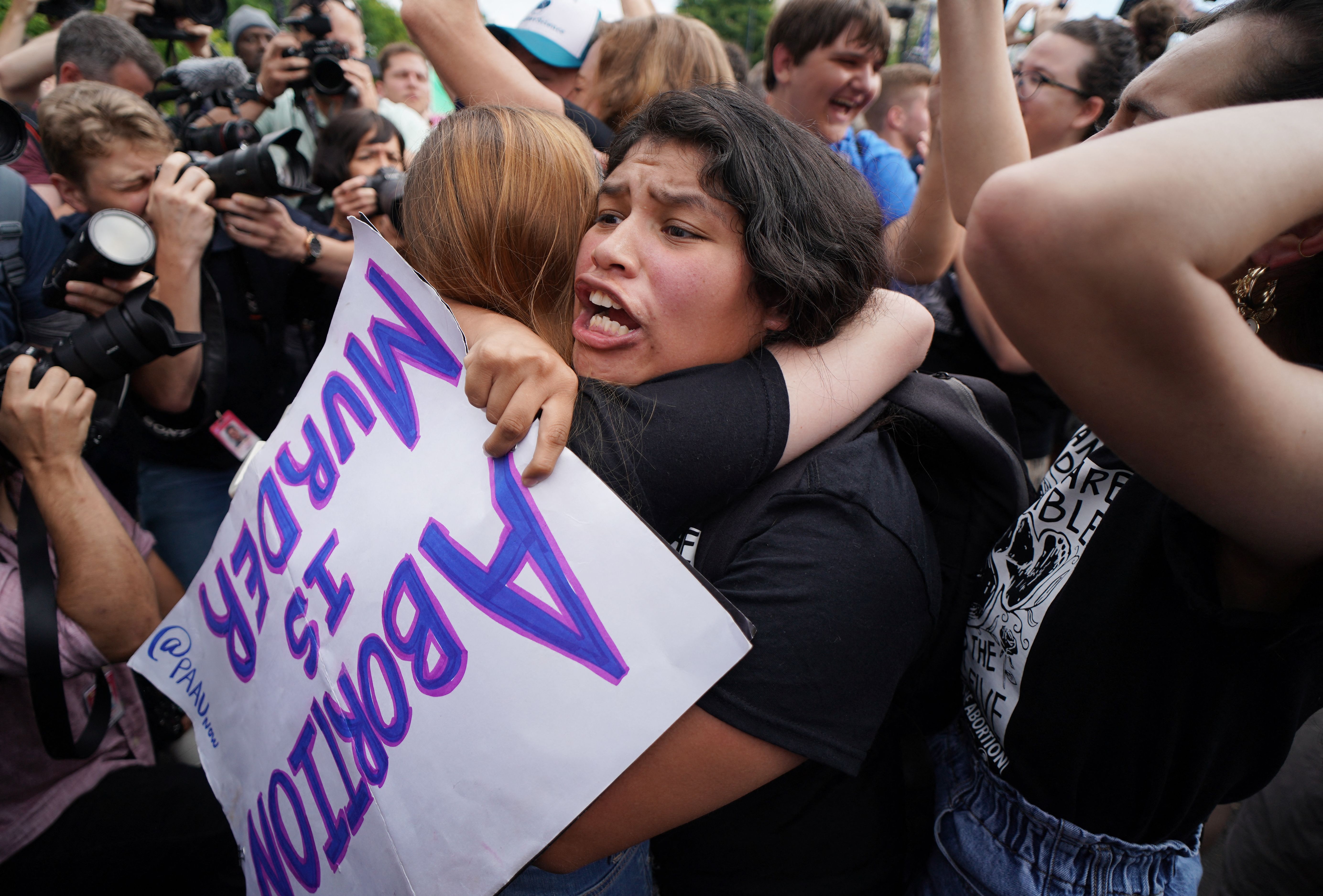 Pro-life supporters celebrate outside the US Supreme Court in Washington, DC, on June 24, 2022. (Photo by Mandel Ngan/AFP via Getty Images)