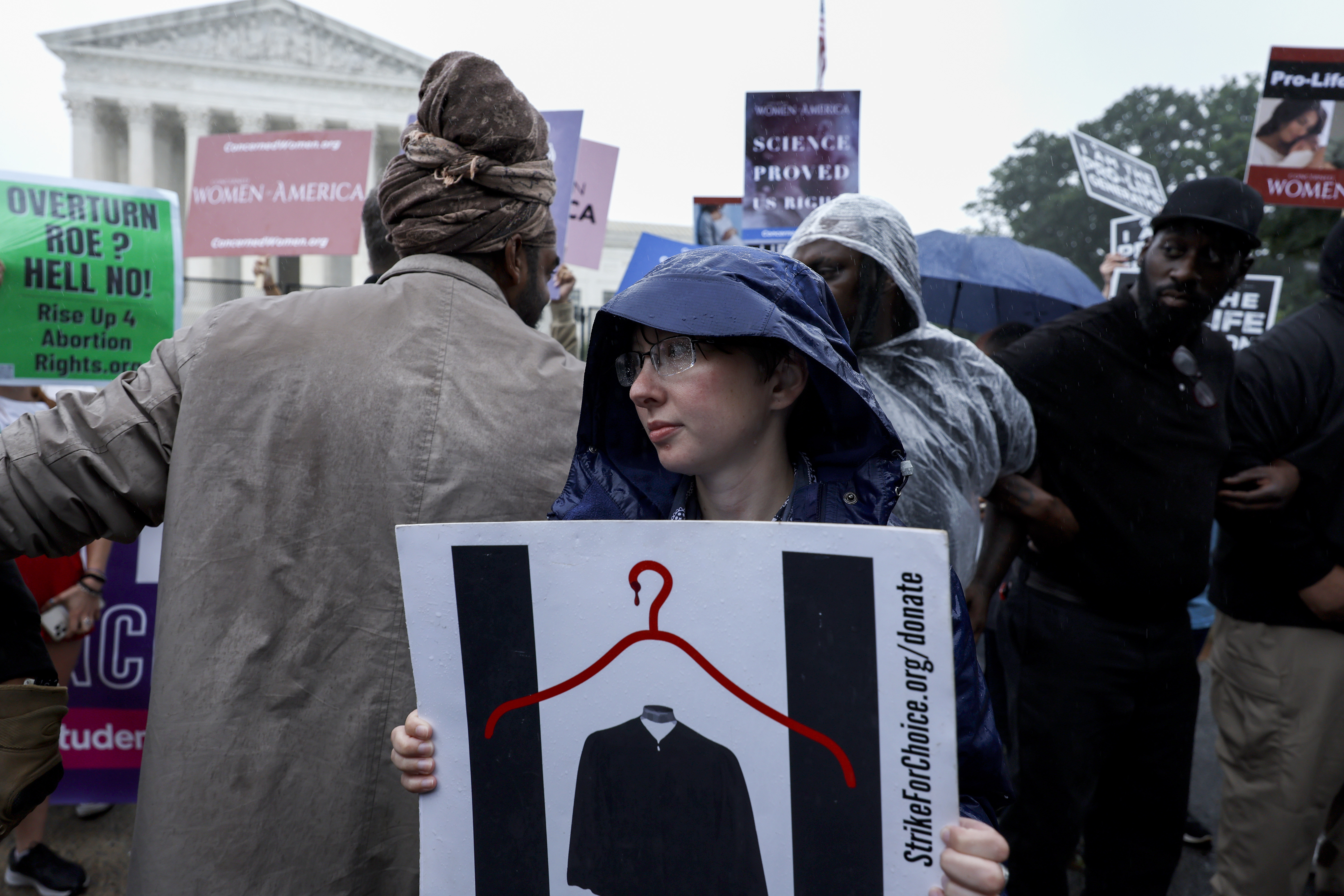 Abortion rights activists demonstrate in front of anti-abortion activists outside of the U.S. Supreme Court Building on June 23, 2022 in Washington, DC. (Photo by Anna Moneymaker/Getty Images)