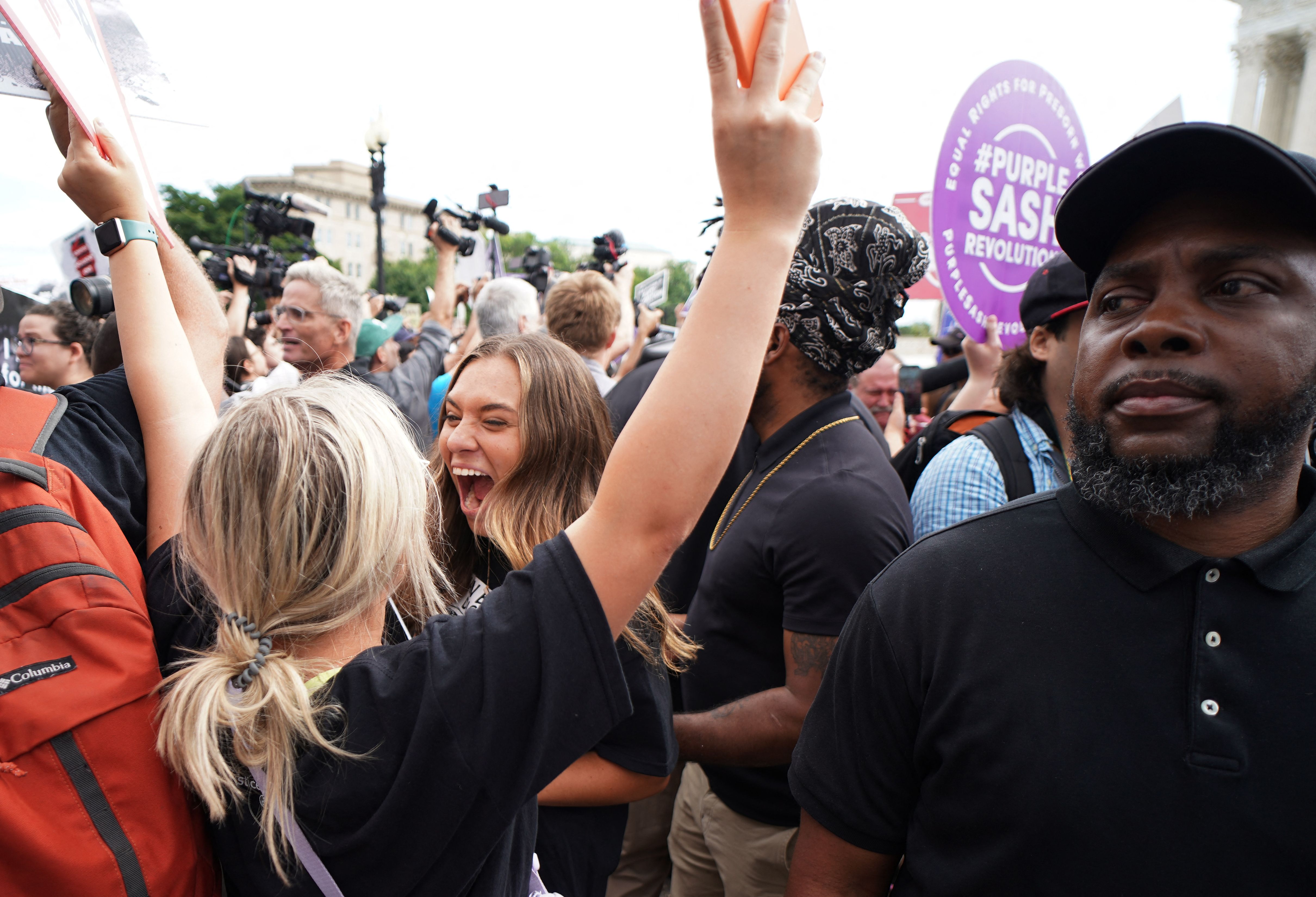 Pro-life supporters celebrate outside the US Supreme Court in Washington, DC, on June 24, 2022. (Photo by Mandel Ngan/AFP via Getty Images)