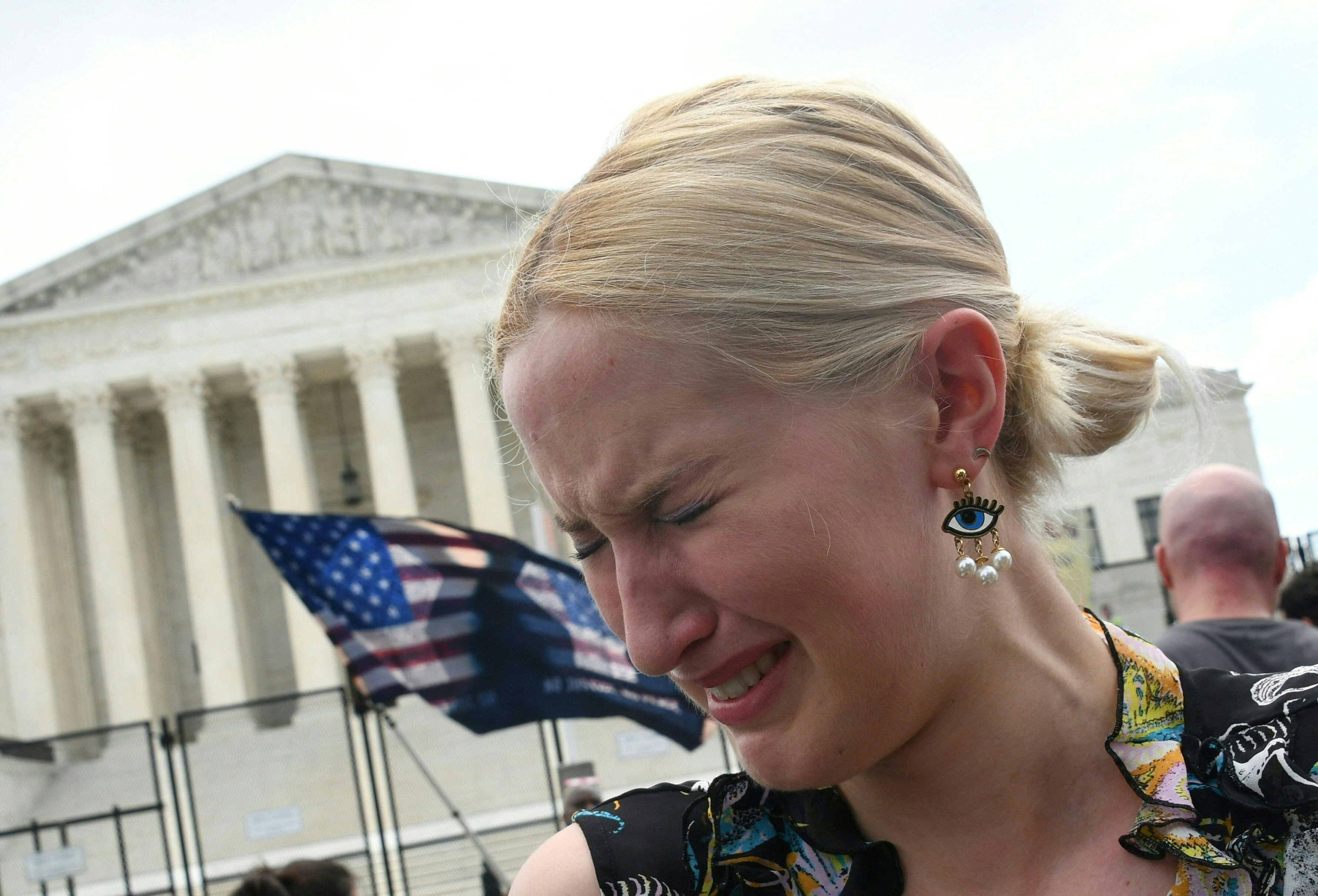 A pro-choice supporter cries outside the US Supreme Court in Washington, DC, on June 24, 2022. (Photo by Olivier Douliery/AFP via Getty Images)