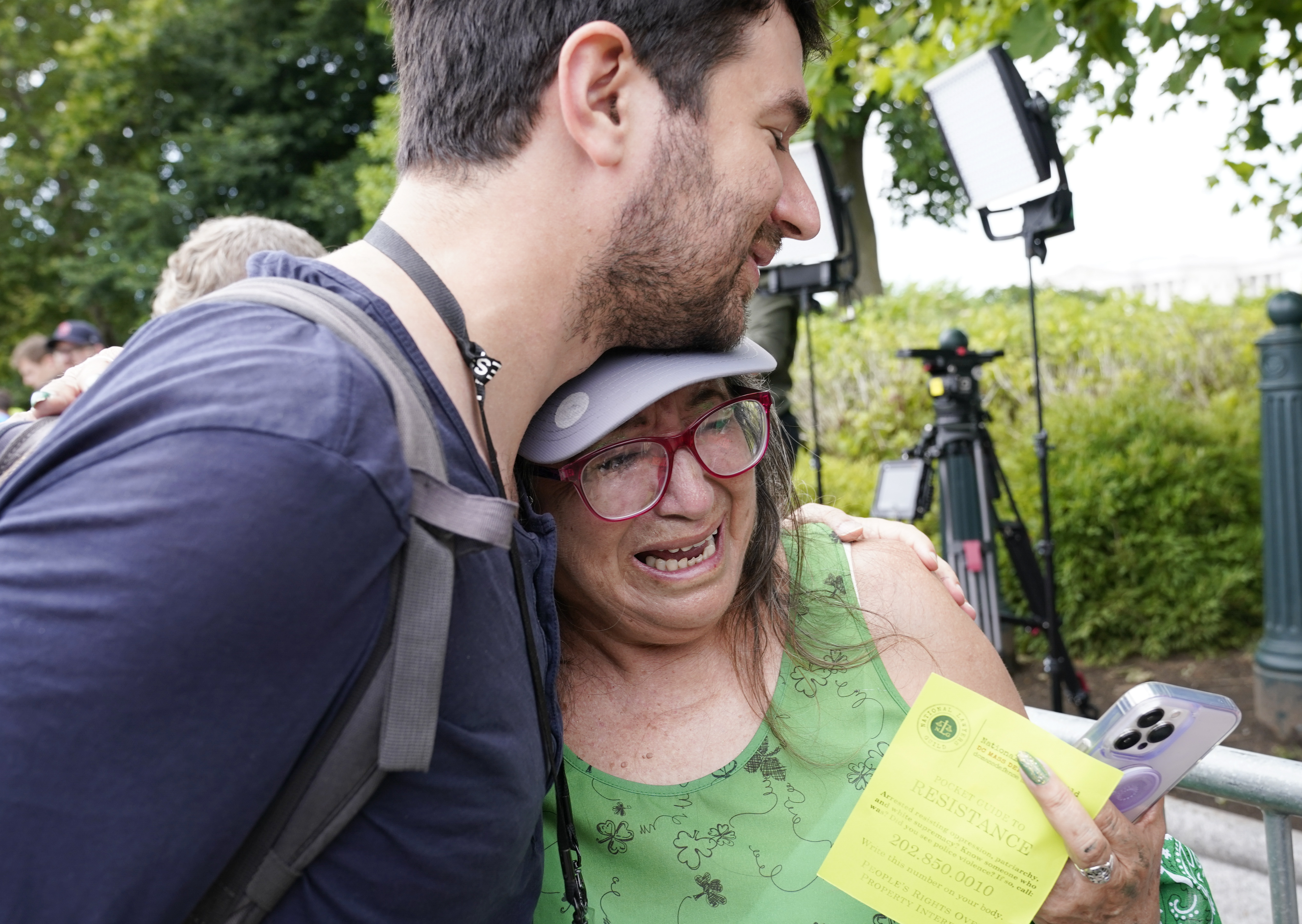 An abortion-rights activist is consoled outside the Supreme Court in Washington, Friday, June 24, 2022.Ê(AP Photo/Jacquelyn Martin)