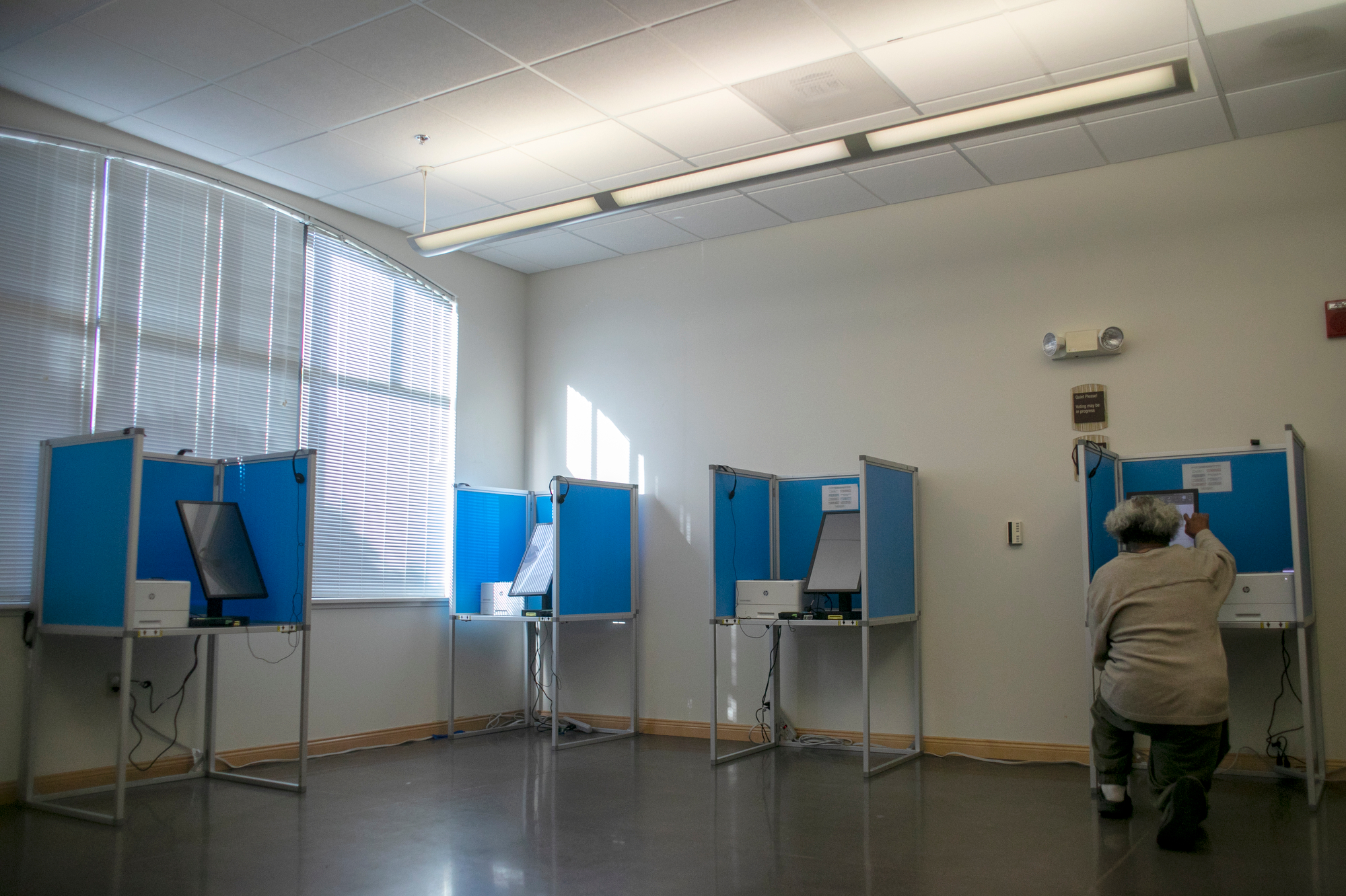 James Calvin Austin Jr., 65, of Martinez, casts a ballot