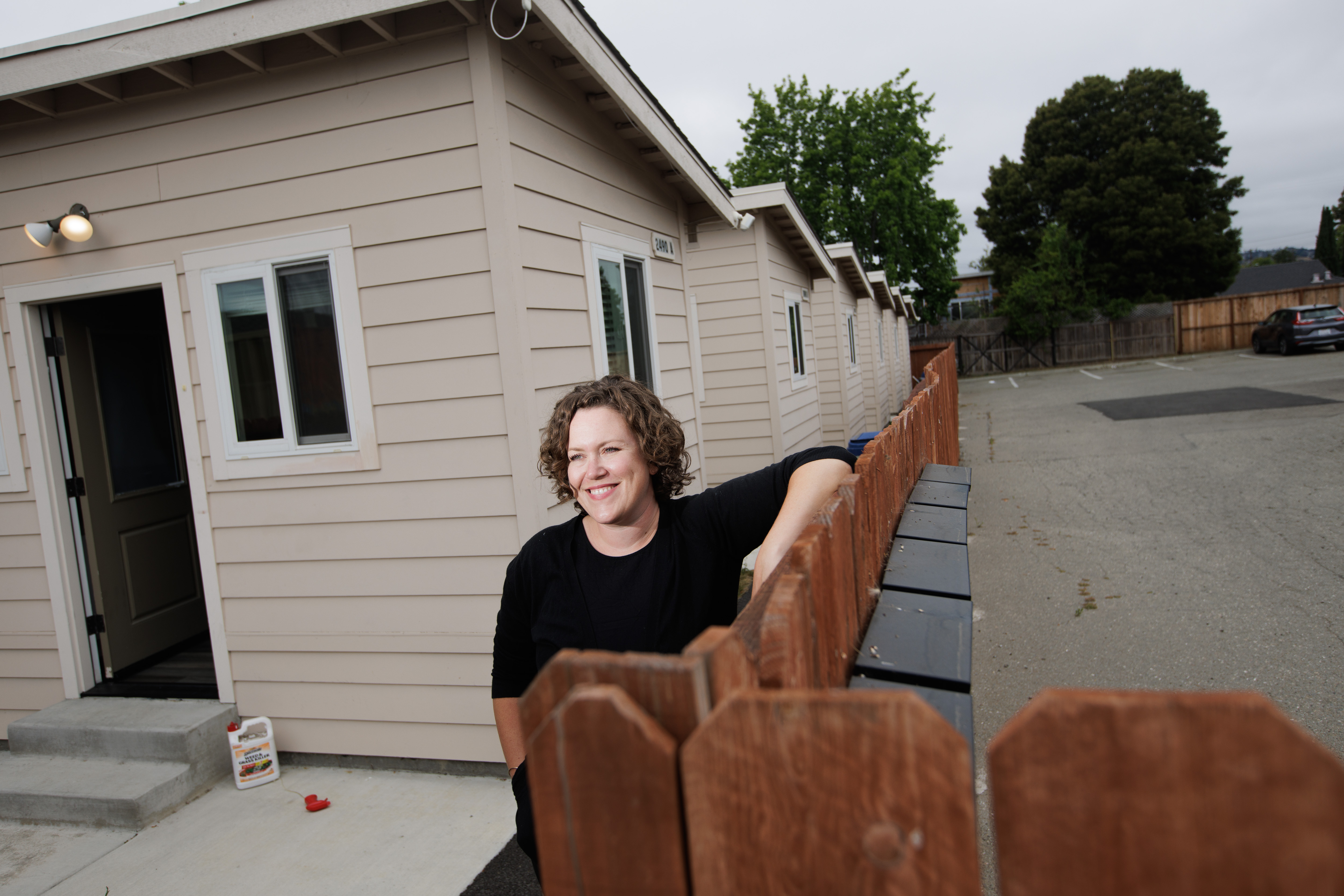 Firm Foundation Community Housing co-founder Taryn Sandulyak poses for a portrait in front of tiny homes located in the parking lot of First Presbyterian Church of Hayward on June 3, 2022, in Castro Valley, Calif. (Dai Sugano/Bay Area News Group)