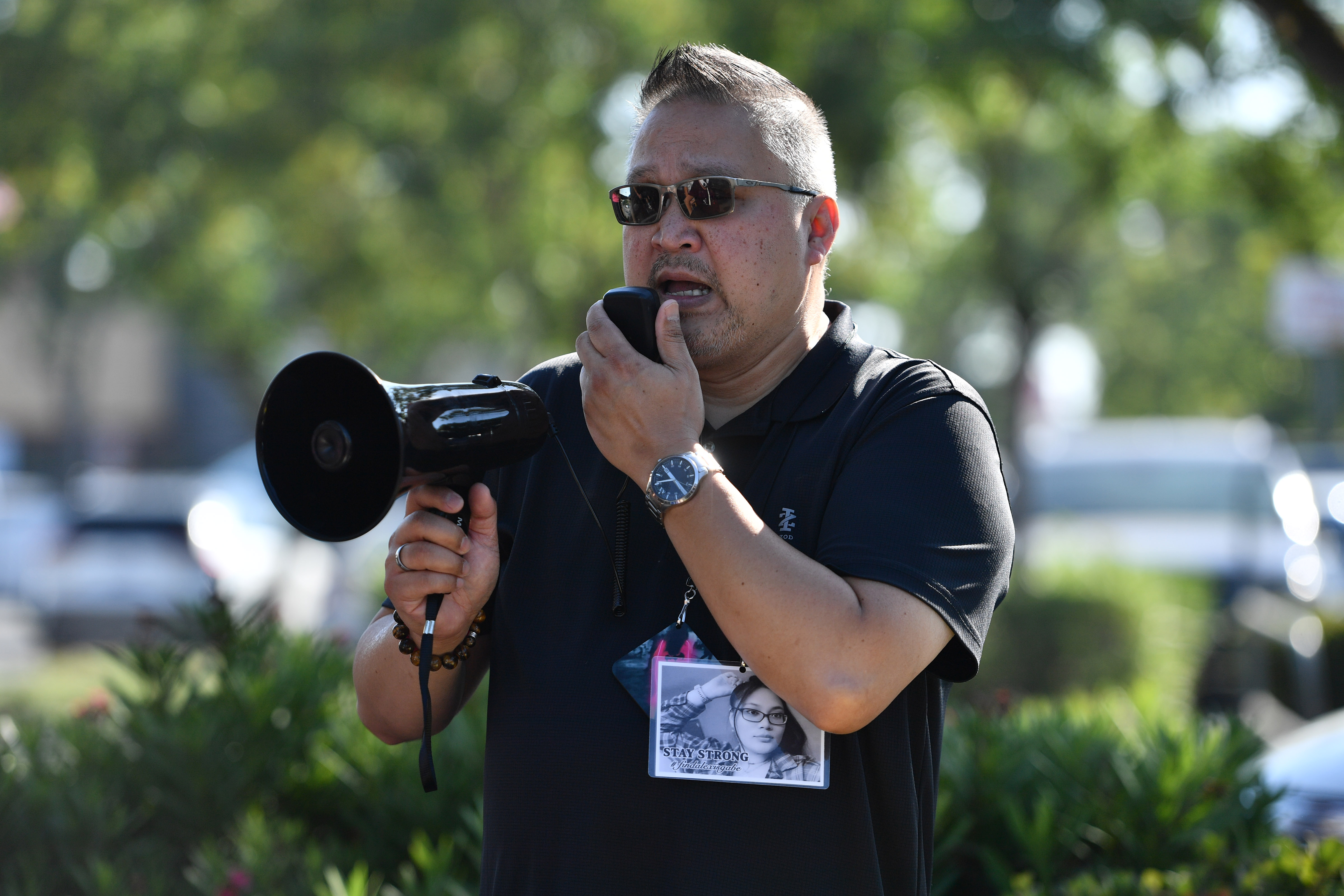 OAKLEY, CA - JULY 16: Gwyn Gabe, father of Alexis Gabe, speaks to volunteers as they prepare to search for evidence in Oakley, Calif., on Saturday, July 16, 2022. Alexis Gabe was reported missing on January 26, 2022. Over 50 volunteers armed with rakes, walking sticks and metal detectors spent three hours searching for evidence along Oakley Road and Live Oak Avenue. (Jose Carlos Fajardo/Bay Area News Group)