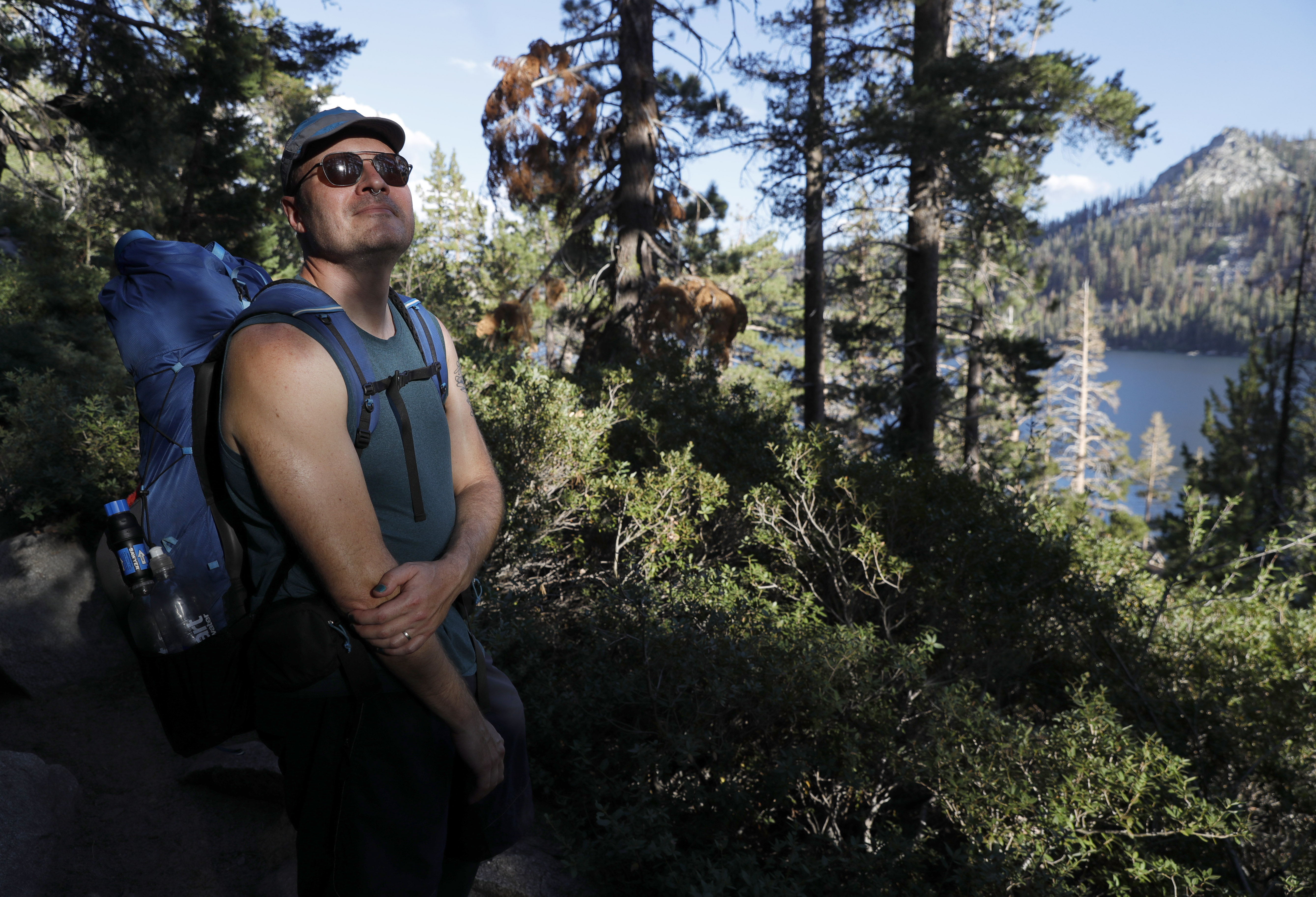 Andrew Schrock, of Long Beach, hikes the Pacific Crest Trail and Tahoe Rim Trail at Echo Lake in Eldorado County, Calif., on Monday, August 8, 2022. The area is recovering from the 2021 Caldor Fire. (Jane Tyska/Bay Area News Group)