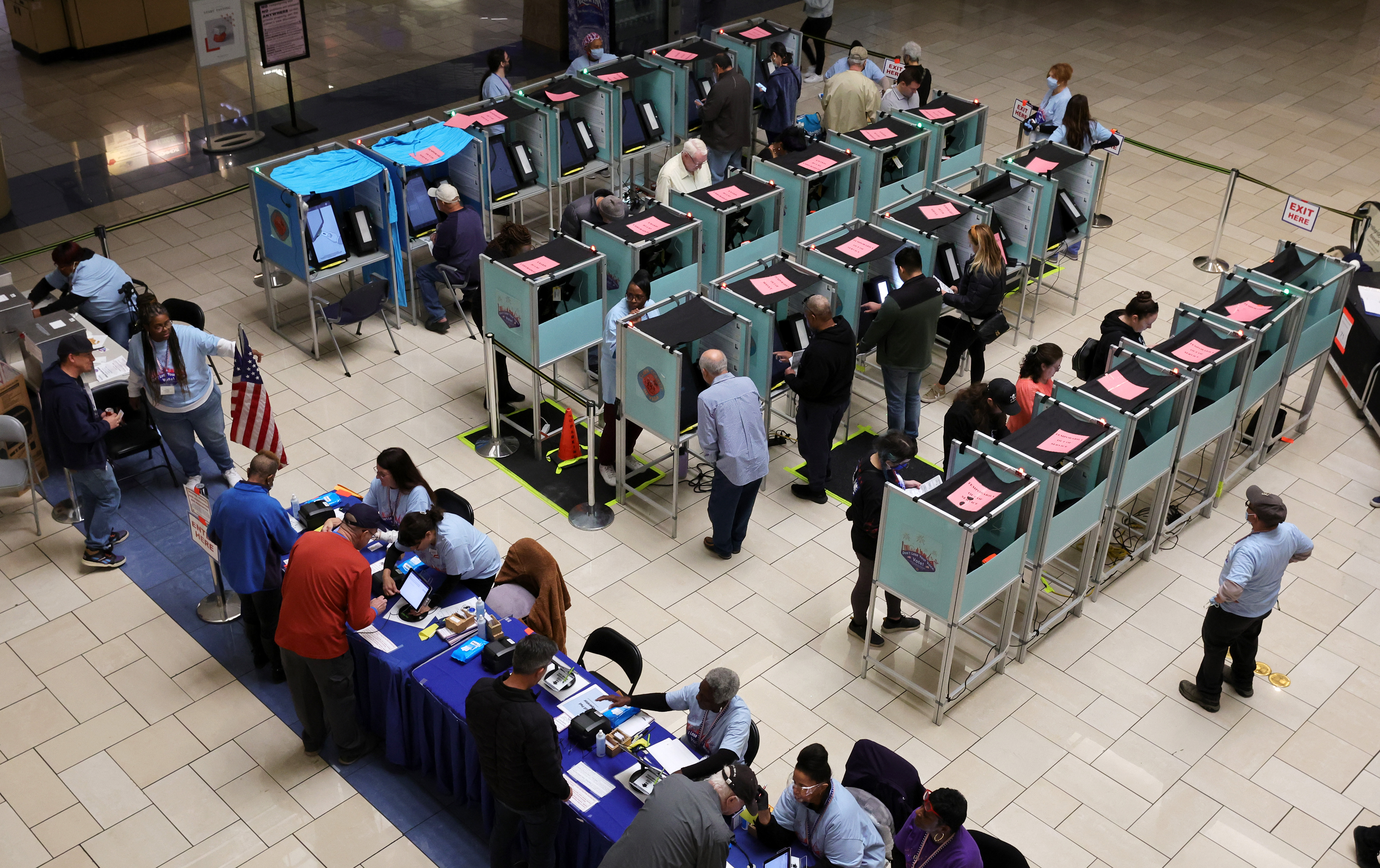 Clark County Election Department poll workers check people in at a table as people vote at the Meadows Mall on November 08, 2022 in Las Vegas, Nevada. (Photo by Ethan Miller/Getty Images)
