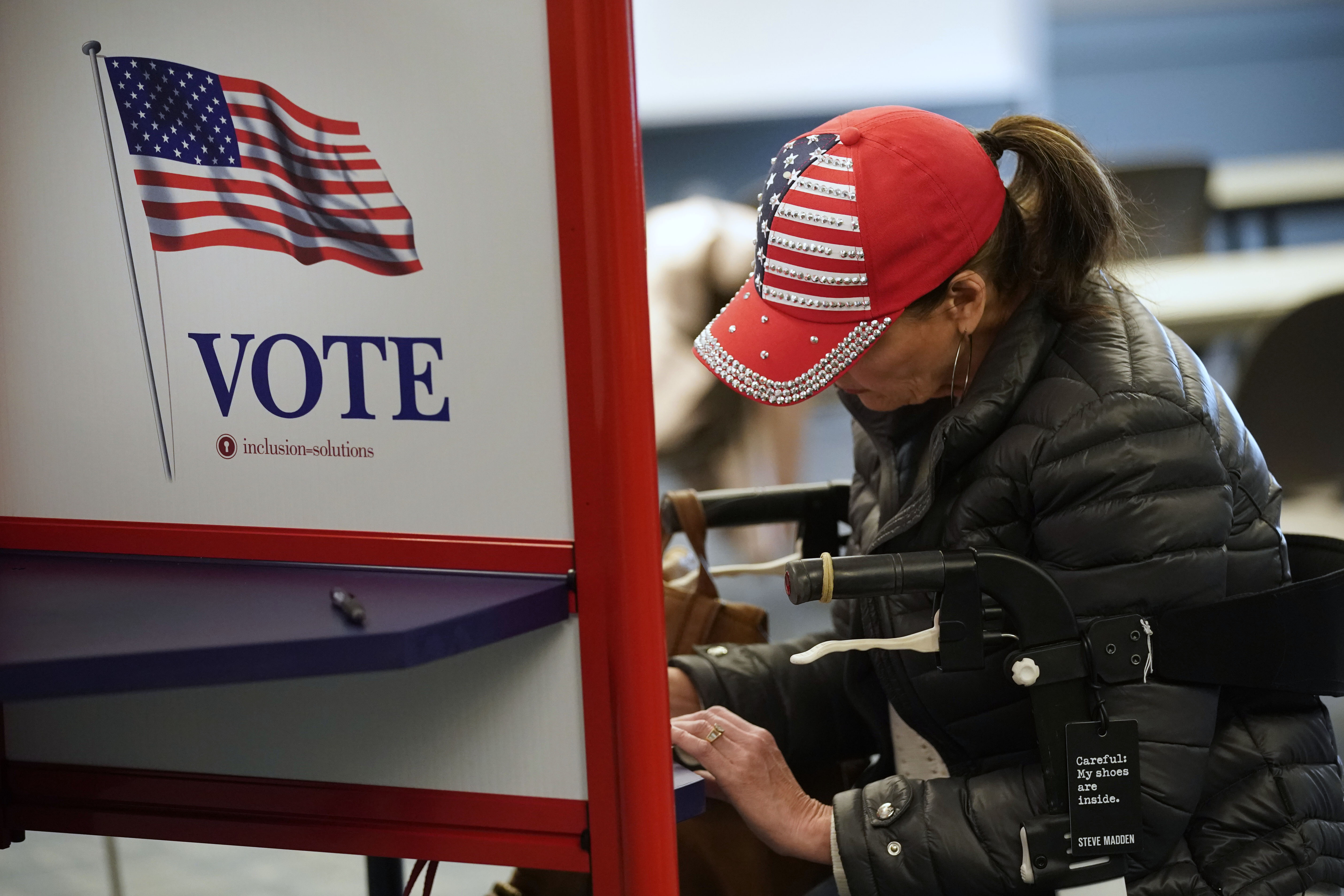 Voters cast their ballots at the Utah County Justice and Health center on November 8, 2022 in Provo, Utah. (Photo by George Frey/Getty Images)