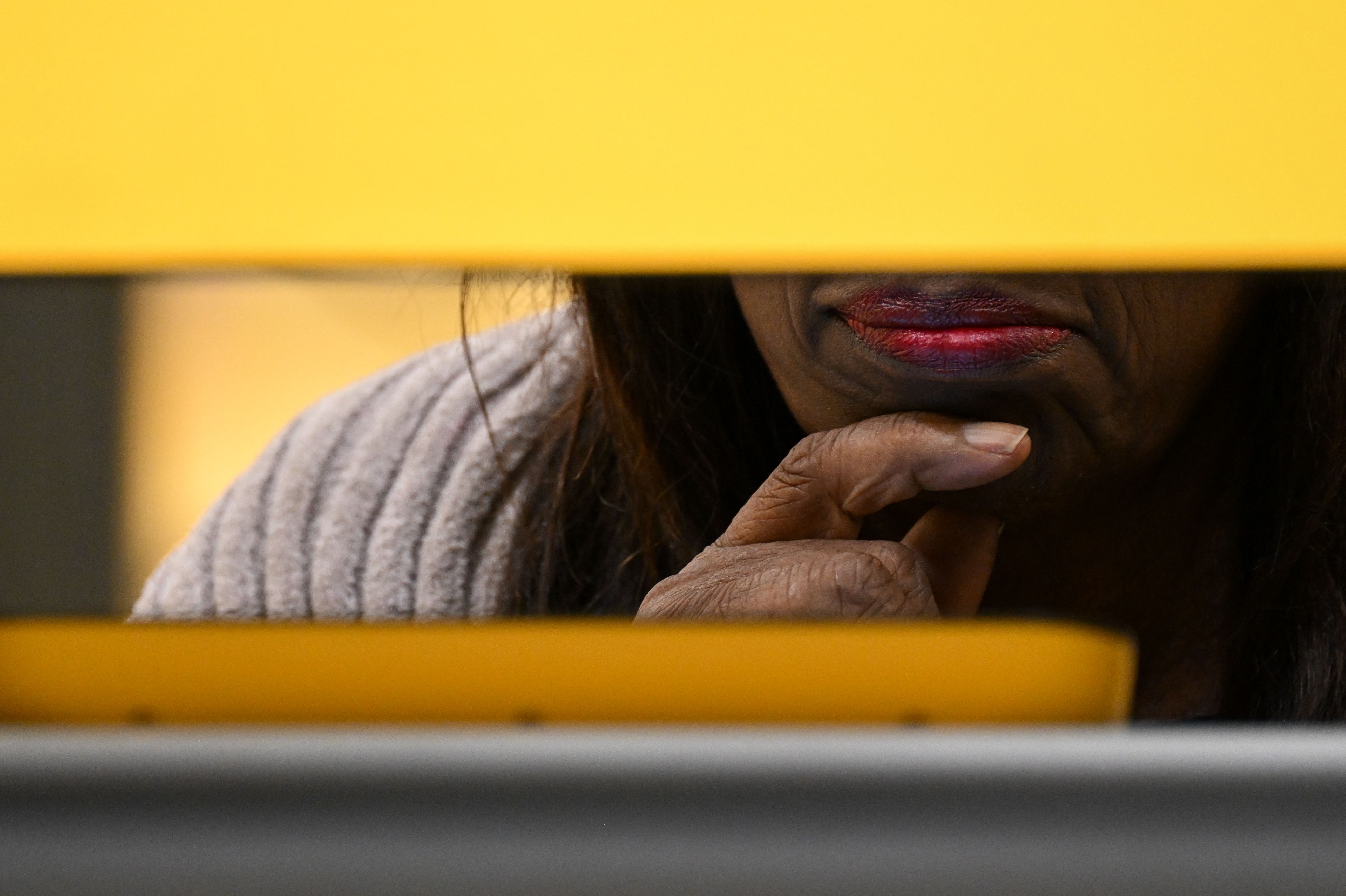A voter casts their ballot for the US midterm election, inside a voting center at Crenshaw High School in Los Angeles, California, on November 8, 2022. (Photo by Patrick T. Fallon/AFP via Getty Images)