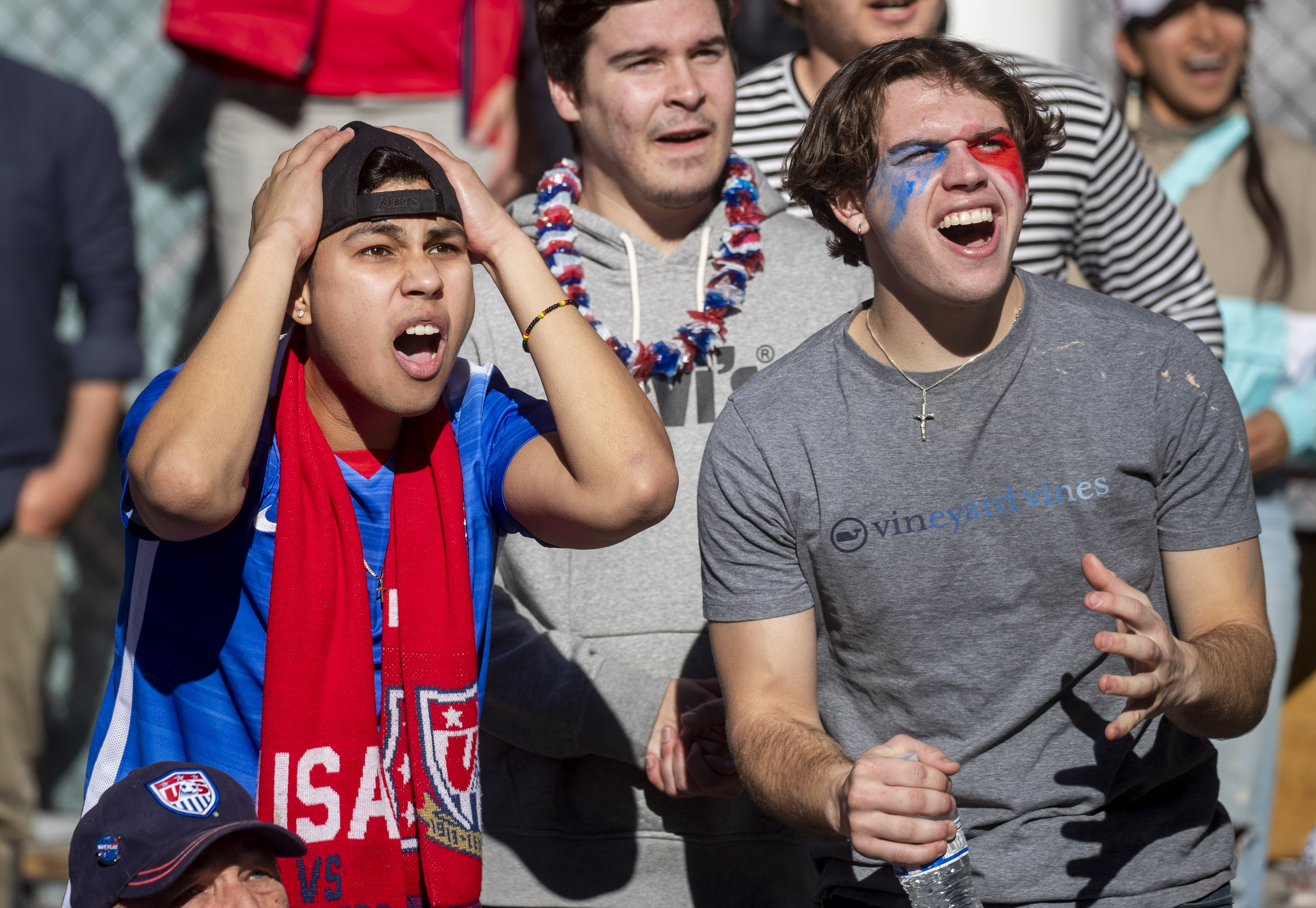 Anthony Mendoza and Shaun Ryan watch the final torturous moments of the United States' tense 1-0 World Cup victory over Iran, Tuesday, Nov. 29, 2022, at an outdoor watch party at The Crossing at East Cut in San Francisco, Calif. (Photo: Karl Mondon/Bay Area News Group)