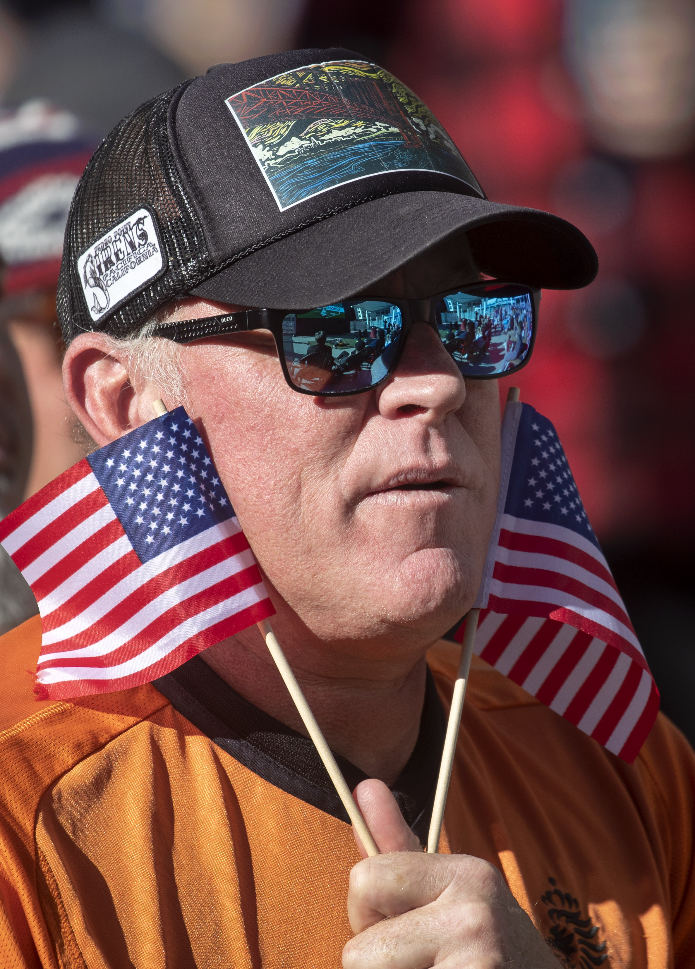 Taz Cole watches a broadcast of the United States soccer team playing Iran in a World Cup soccer match, Tuesday, Nov. 29, 2022, during an outdoor watch party at The Crossing at East Cut in San Francisco, Calif. (Karl Mondon/Bay Area News Group)