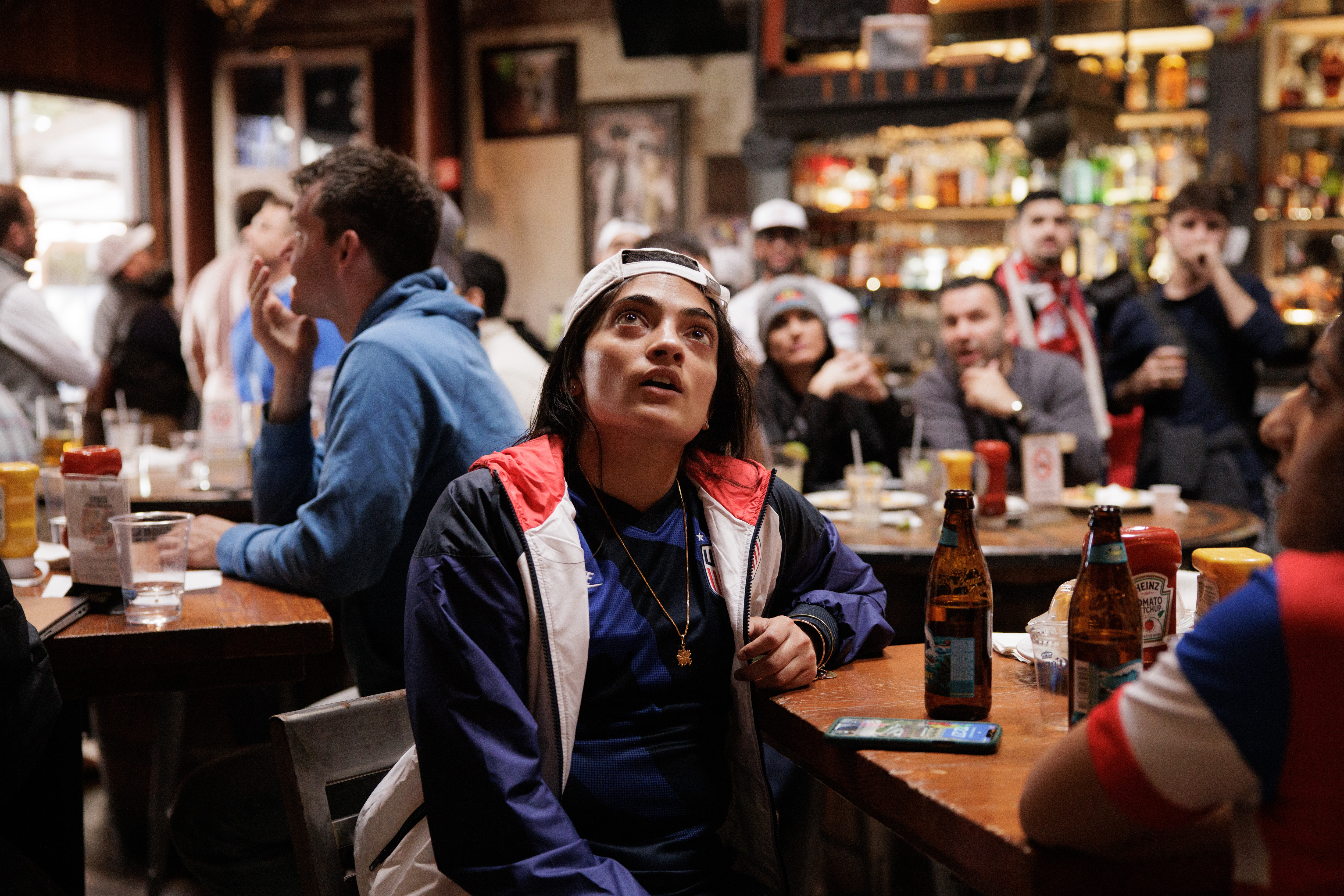 Deepa Patel, of San Bruno, watches the United States men's national team World Cup match against Iran at The Old Wagon Saloon & Grill in downtown San Jose, Calif., on Tuesday, Nov. 29, 2022. (Dai Sugano/Bay Area News Group)