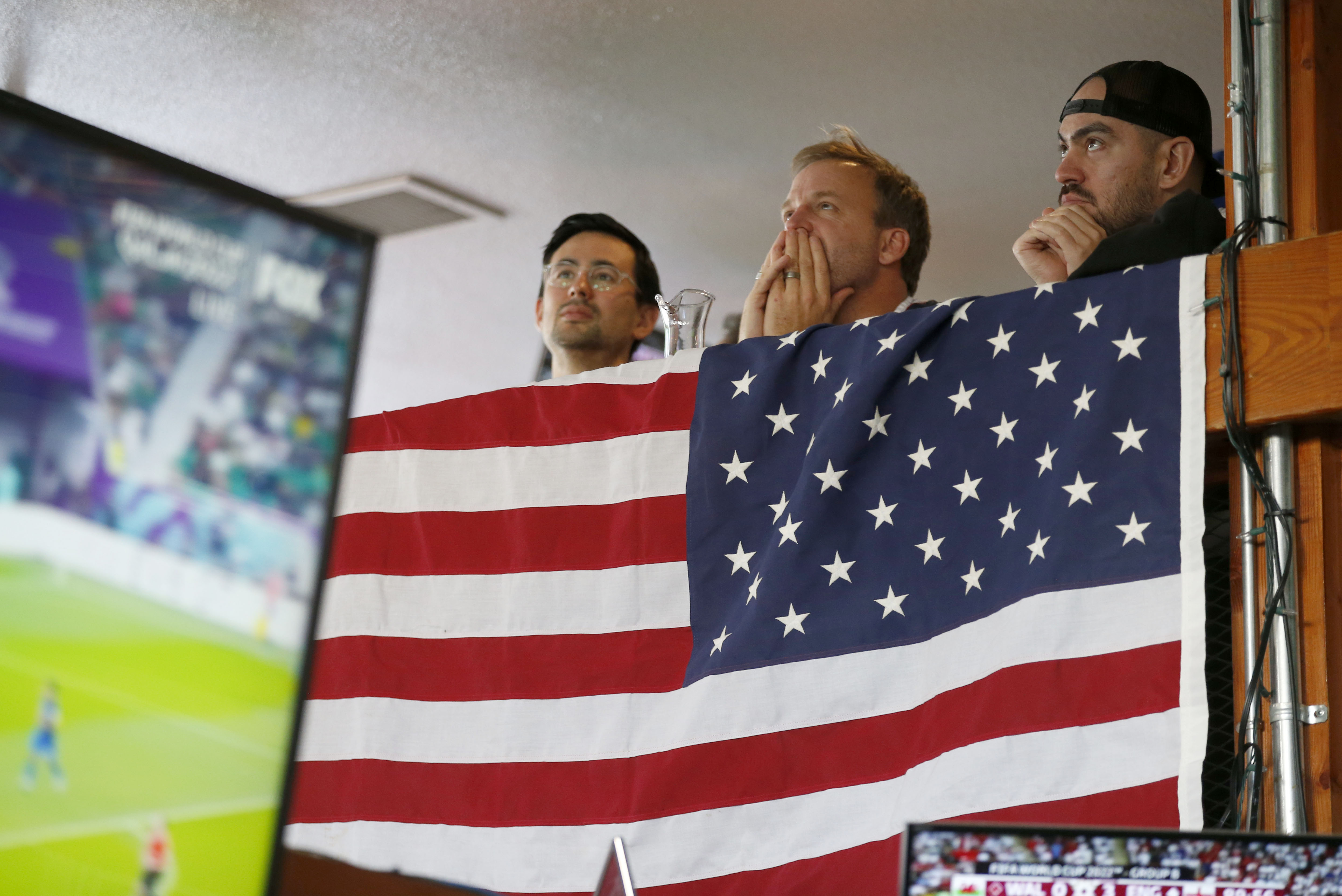 Patrons watch the United States men's national team's match against Iran during a World Cup watch party at The Athletic Club Oakland in downtown Oakland, Calif., on Tuesday, Nov. 29, 2022. The U.S. beat Iran 1-0. (Jane Tyska/Bay Area News Group)