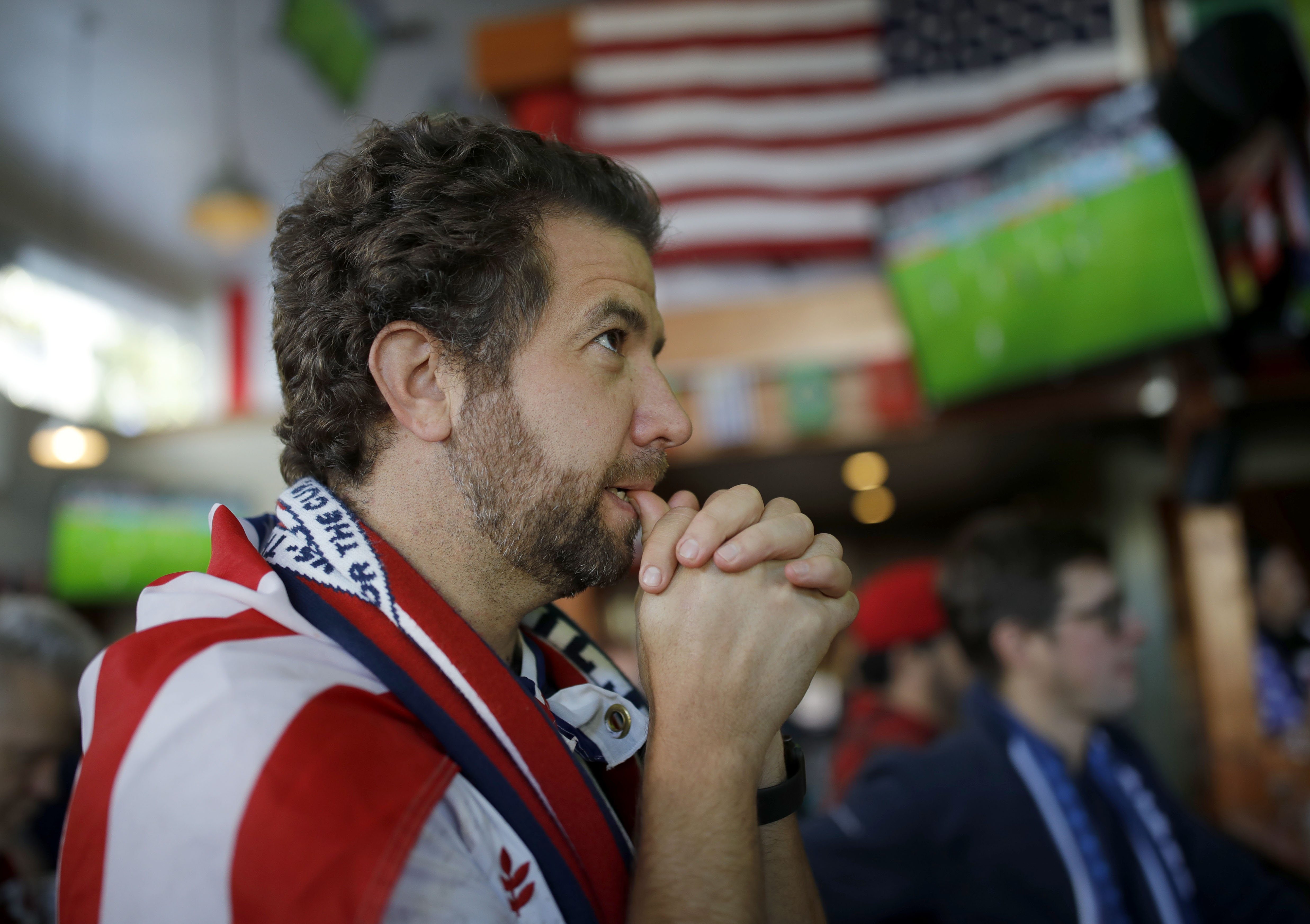 Jason Purdy, of Alameda, left, reacts as he watches the United States men's national team's match against Iran during a World Cup watch party at The Athletic Club Oakland in downtown Oakland, Calif., on Tuesday, Nov. 29, 2022. The U.S. beat Iran 1-0. (Jane Tyska/Bay Area News Group)