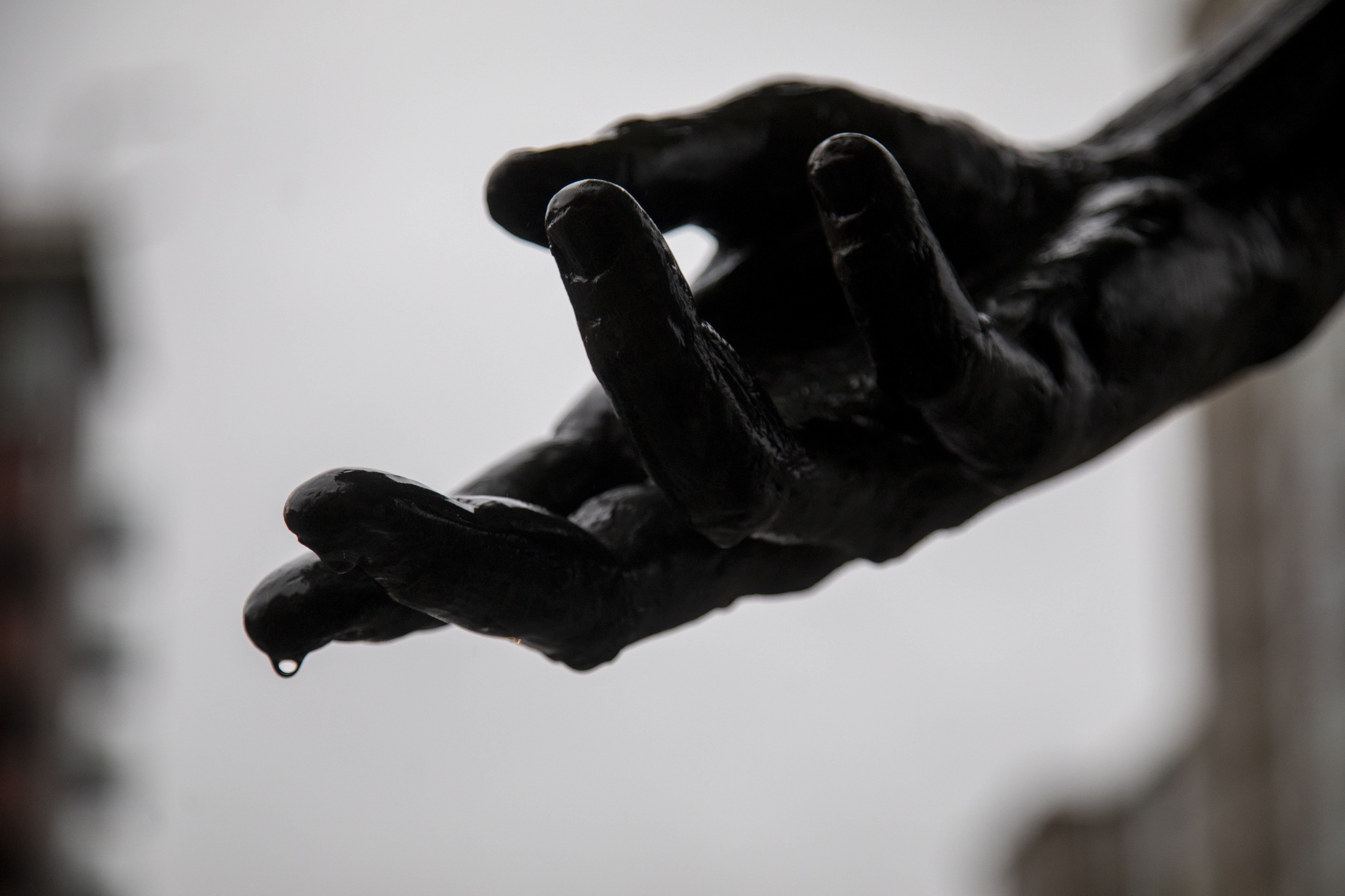 On the day of Gaylord Perry's passing, water drips from the finger tips of a statue of baseballs most infamous spitball pitcher, at Oracle Park in San Francisco, Calif., Thursday, Dec. 1, 2022. (Karl Mondon/Bay Area News Group)