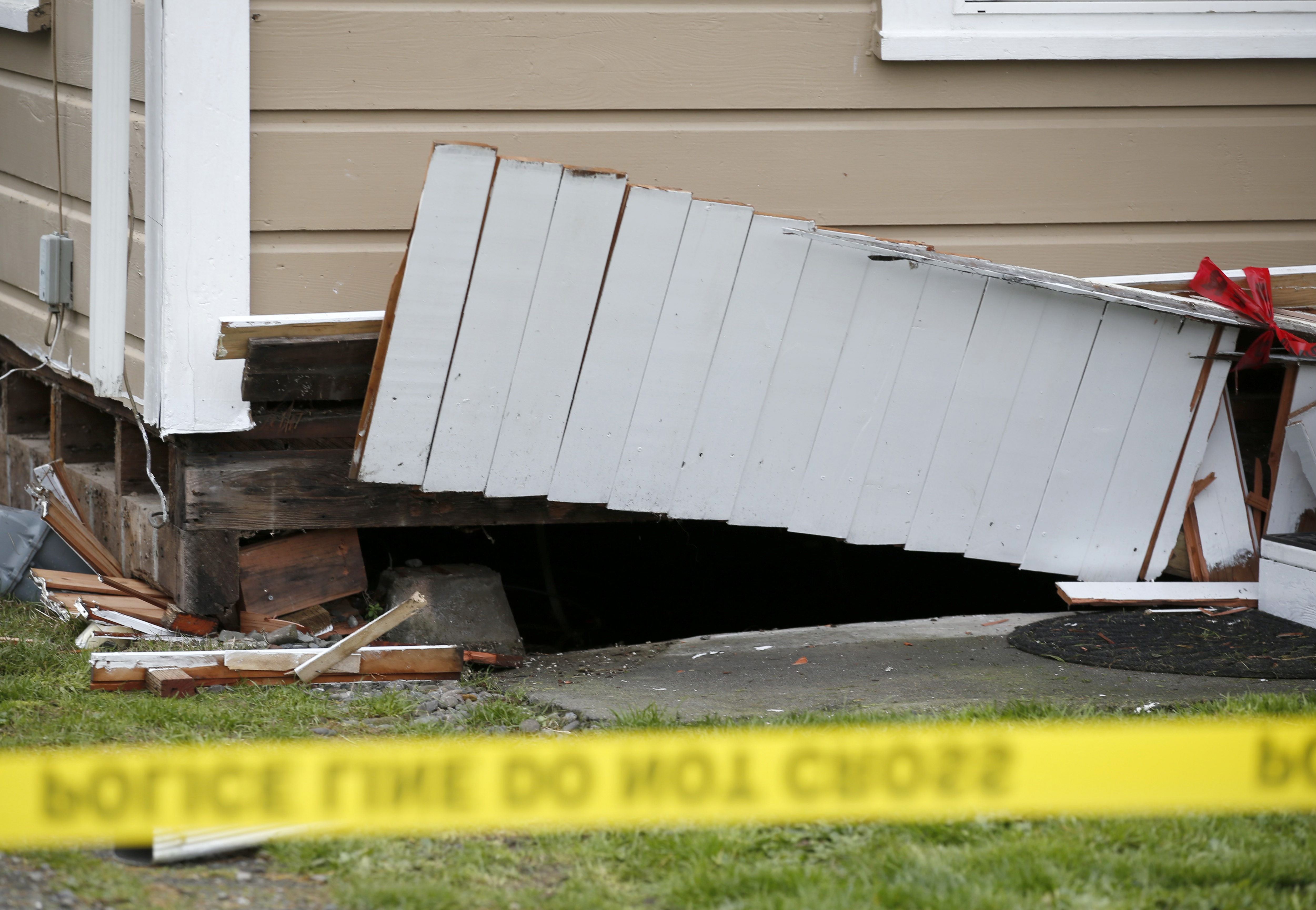 Earthquake damage is seen at Jacqui McIntosh's house on Painter Street in Rio Dell, Calif., on Tuesday, Dec. 20, 2022.