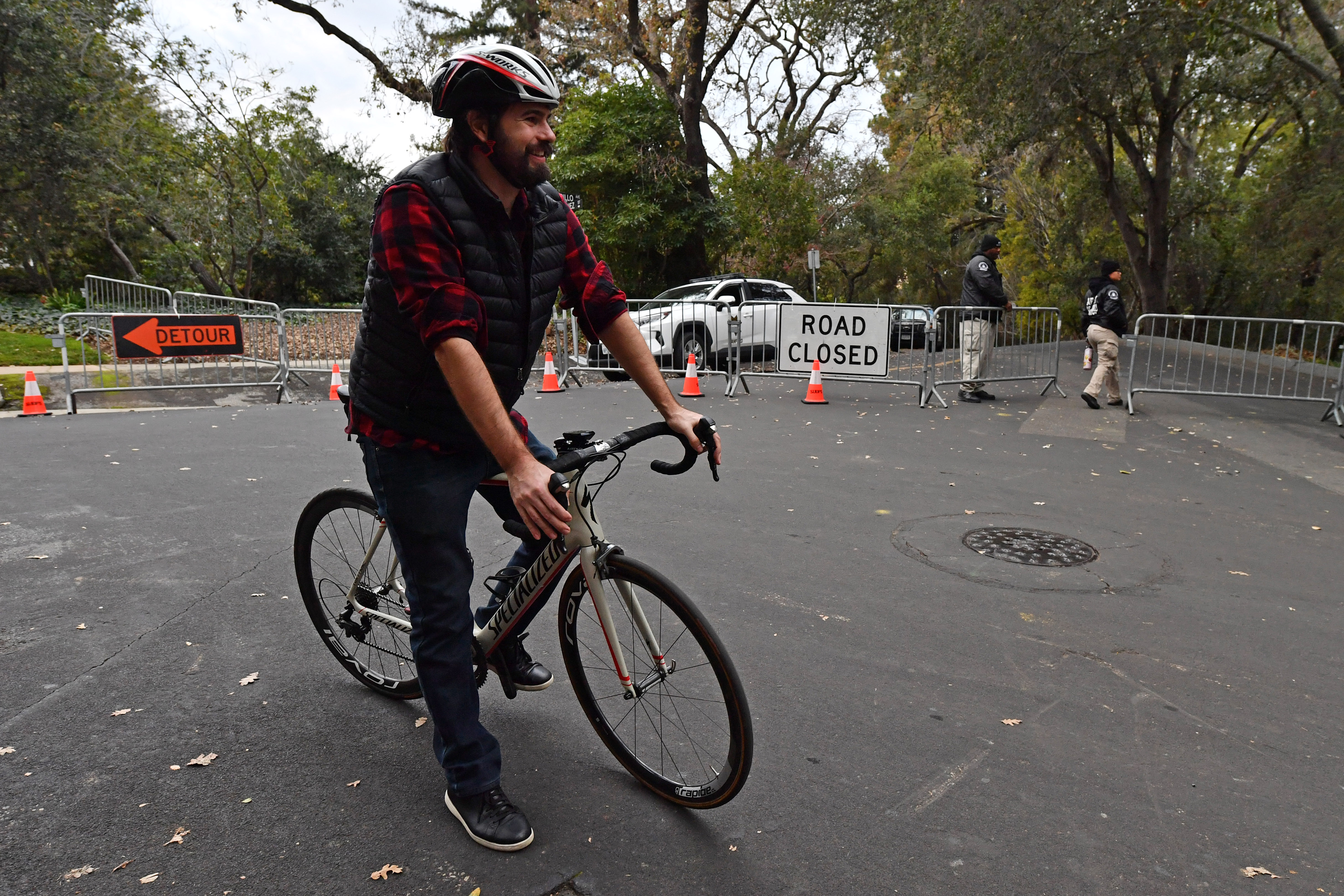 Nick Bax, a Stanford graduate and crypto researcher, stopped to see if he could catch a glimpse of Sam Joseph Bankman-Fried near the home of Joseph Bankman and his wife Barbara Fried in Stanford, Calif., on Thursday, Dec. 22, 2022.