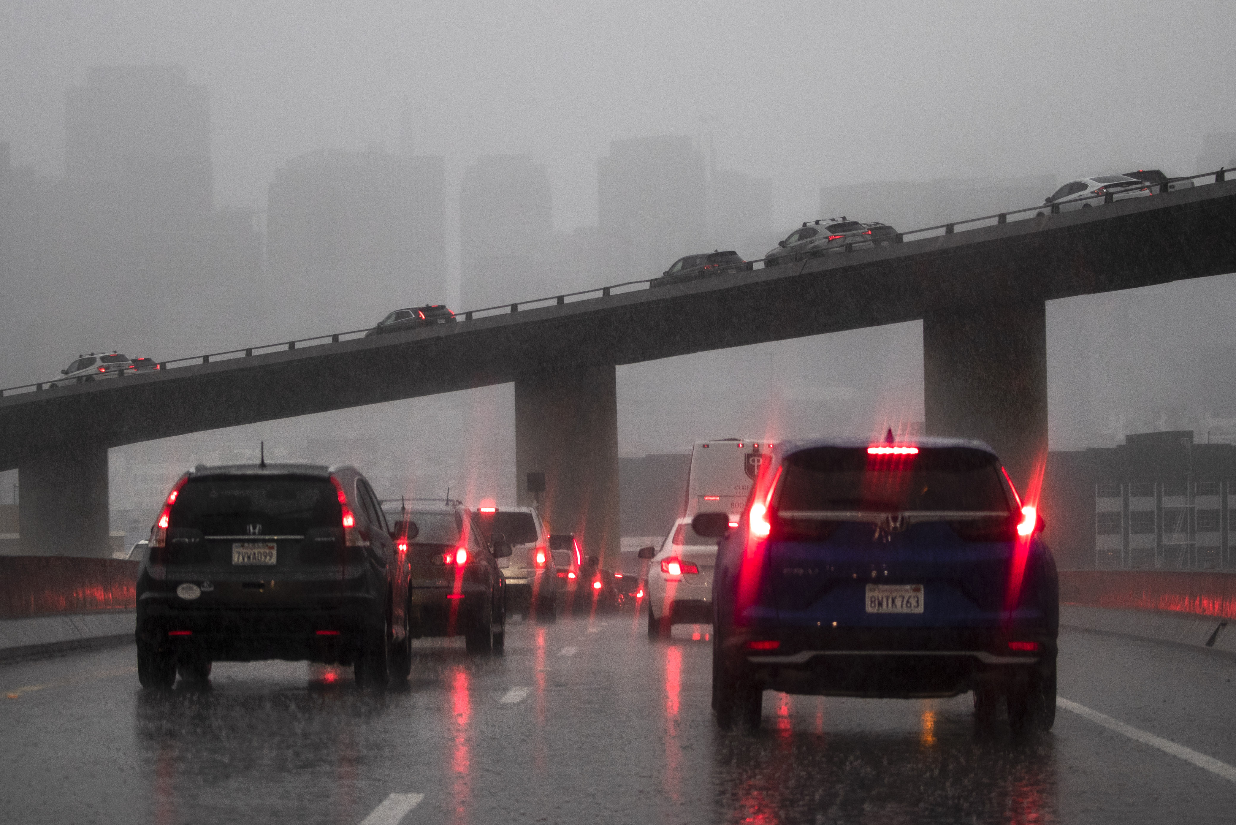 Rush hour traffic on Interstate 280 inches into downtown San Francisco, Calif., as a storm arrives on Thursday morning, Dec. 1, 2022. (Karl Mondon/Bay Area News Group)