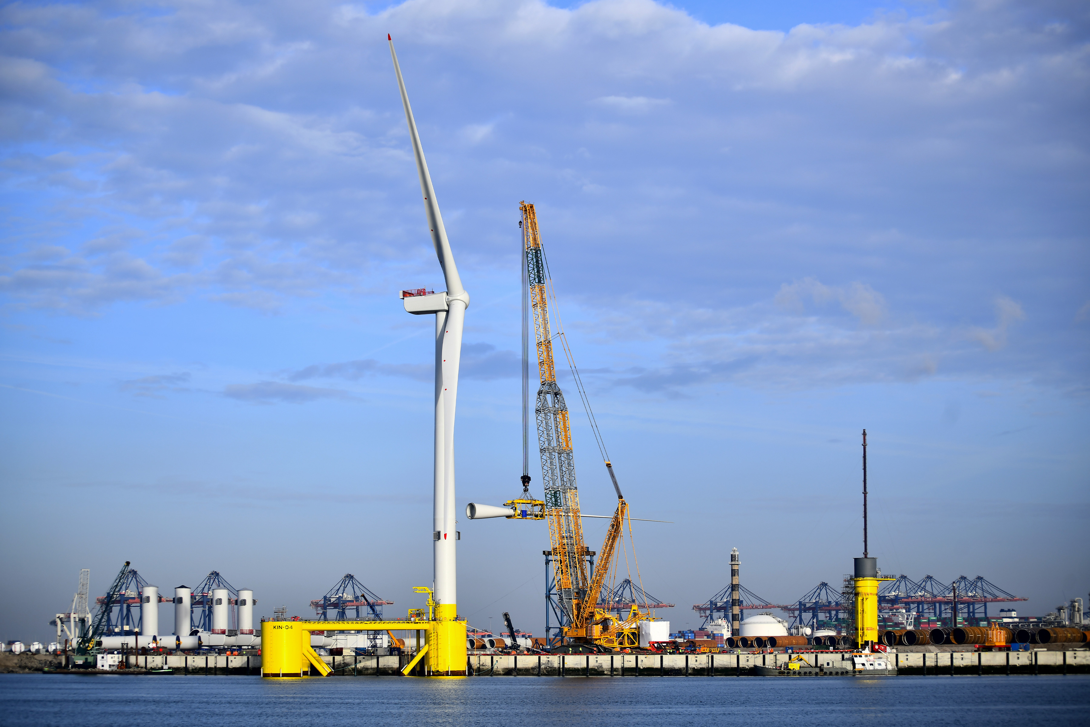 A 9.5-megawatt floating wind turbine for Scotland's Kincardine Offshore Wind project at its assembly dock in the Netherlands. (Photo: Offshore Wind California / Principle Power)
