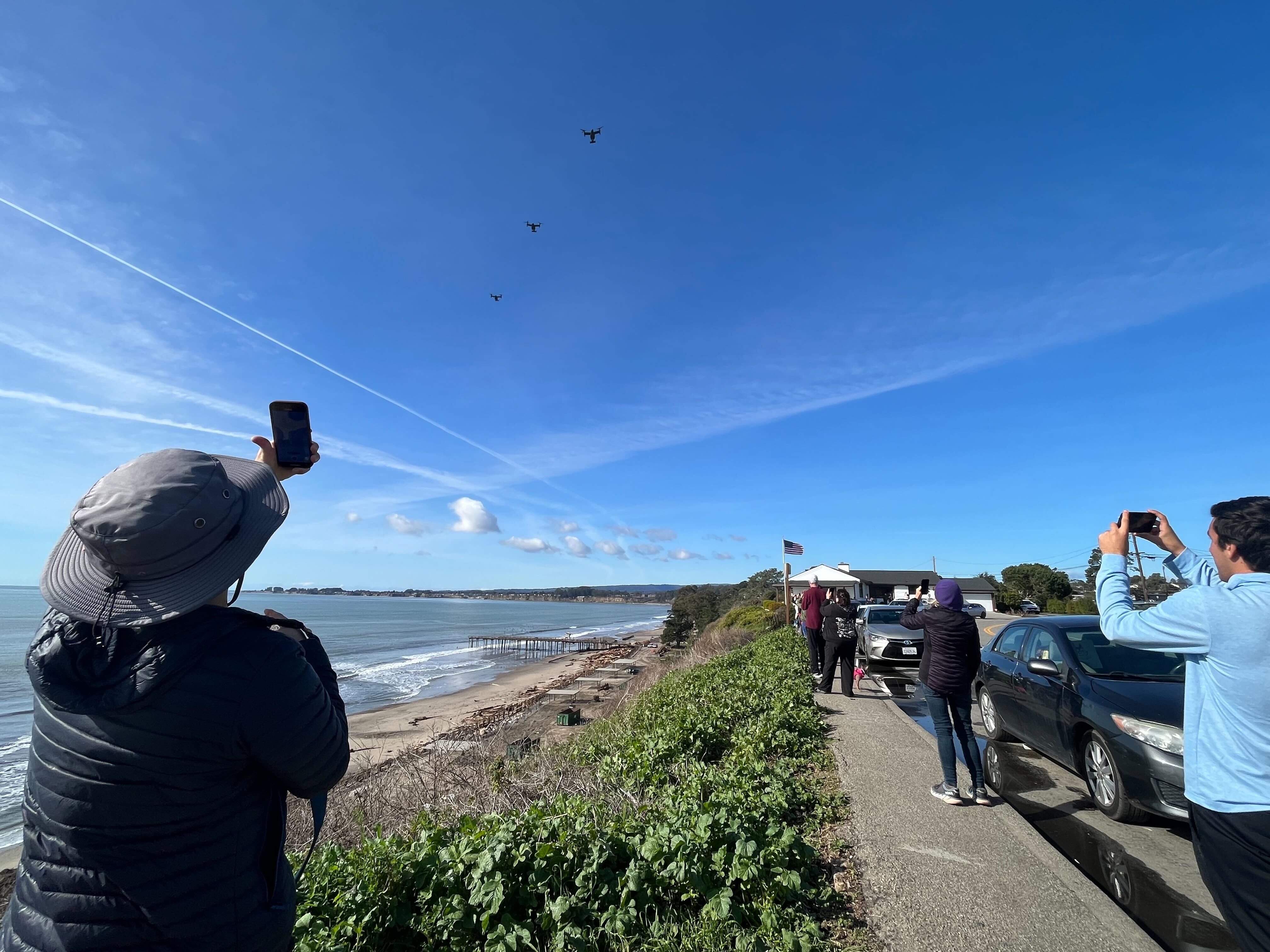 Onlookers wait for President Joe Biden above Seacliff State Beach near Santa Cruz, Thursday Jan. 19, 2023.
