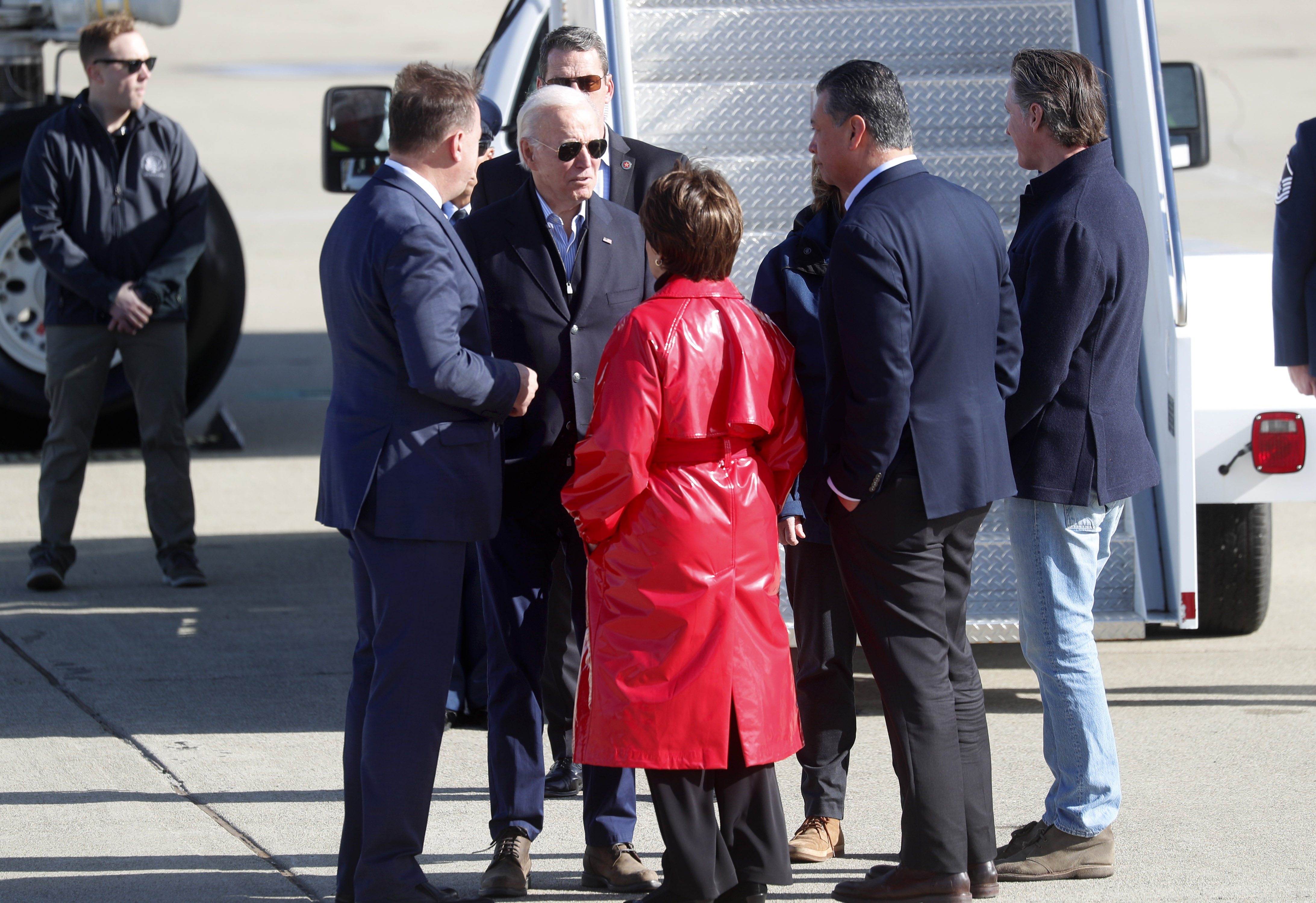 President Joe Biden is met by U.S. Rep. Anna Eshoo, D-Palo Alto, U.S. Senator Alex Padilla and California Governor Gavin Newson at Moffett Federal Airfield in Mountain View, Calif., before a tour of flood-damaged Santa Cruz County, Thursday, Jan. 19, 2023.