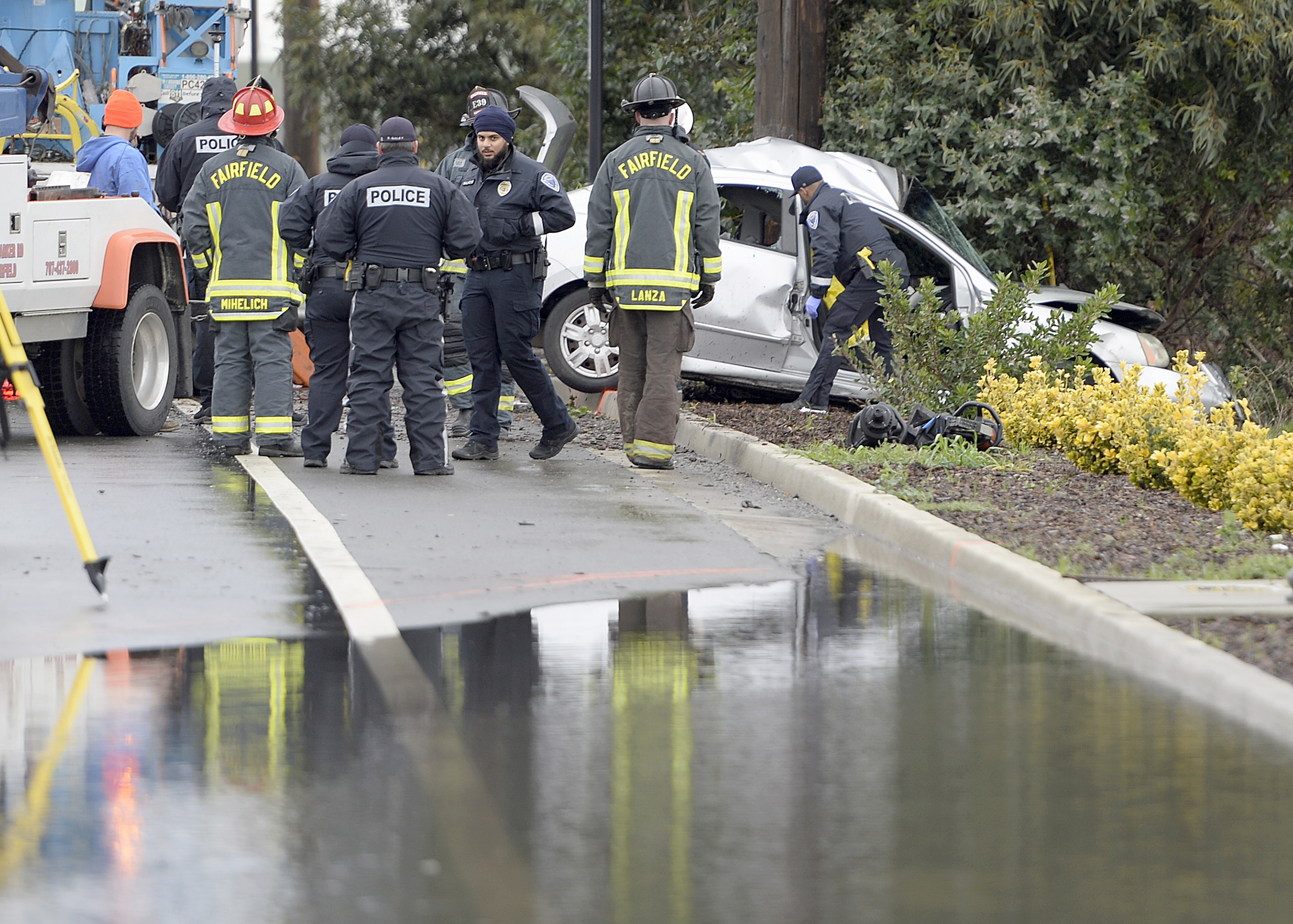 Fairfield Police begin their investigation into a crash that claimed the life of a 19-year-old woman Wednesday morning. According to  Fairfield Police Department spokeswoman, Jennifer Brantley, officers responded to the call of a vehicle accident on eastbound Vanden Road. at 8:39 a.m. and located a vehicle that had collided with a utility pole along the side of the road. Eastbound Vanden Rd. was closed for several hours as officers conducted their investigation and weather is believed to be a factor in the crash as a large pool of standing water was on the roadway near the crash scene. The name of the victim and the city of residence are being withheld pending notification of next of kin, according to Brantley.(Joel Rosenbaum / The Reporter)