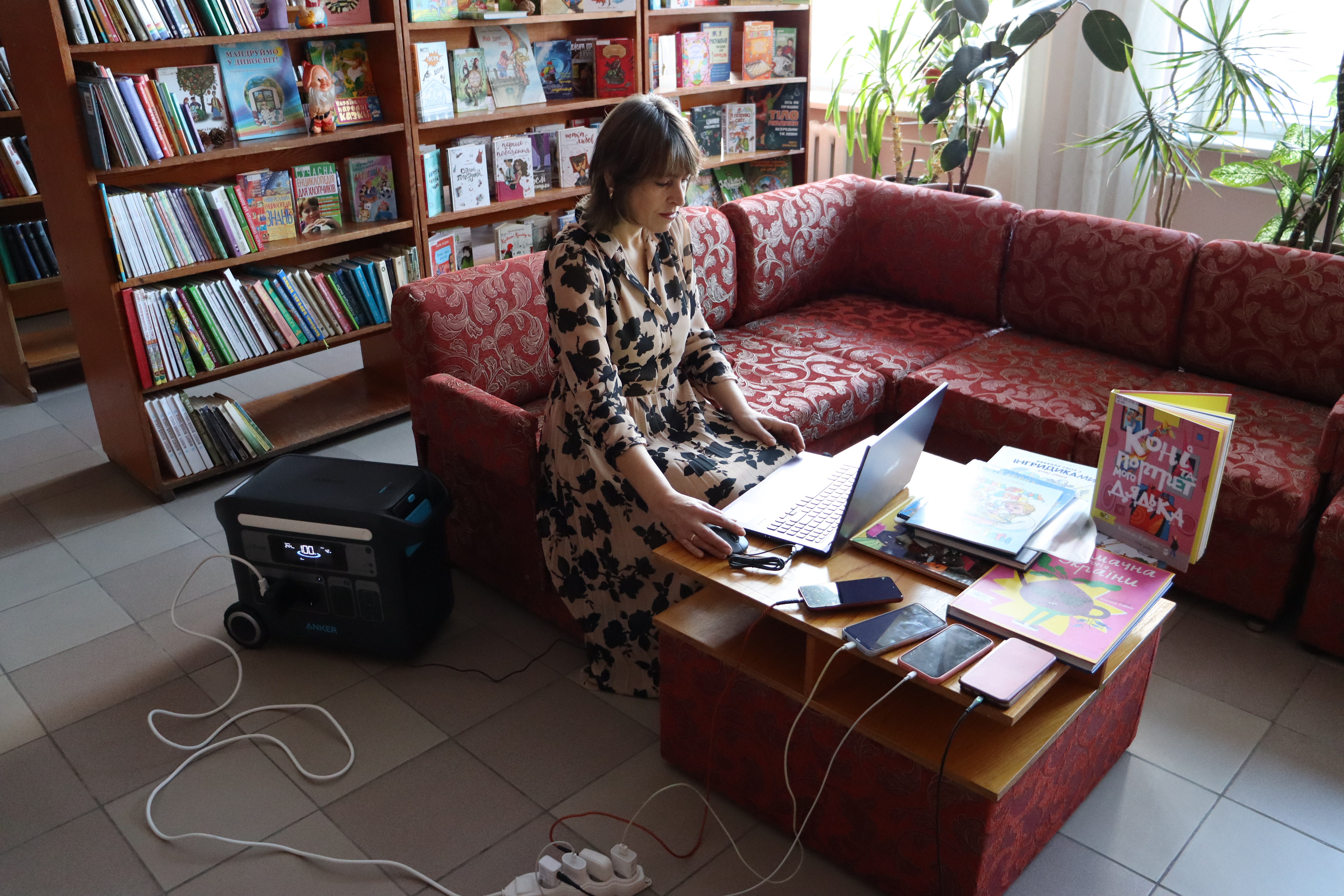 A staff member of the Taras Shevchenko Regional Library in Cherkasy uses their new generator earlier this month.(Courtesy of the Taras Shevchenko Regional Library)