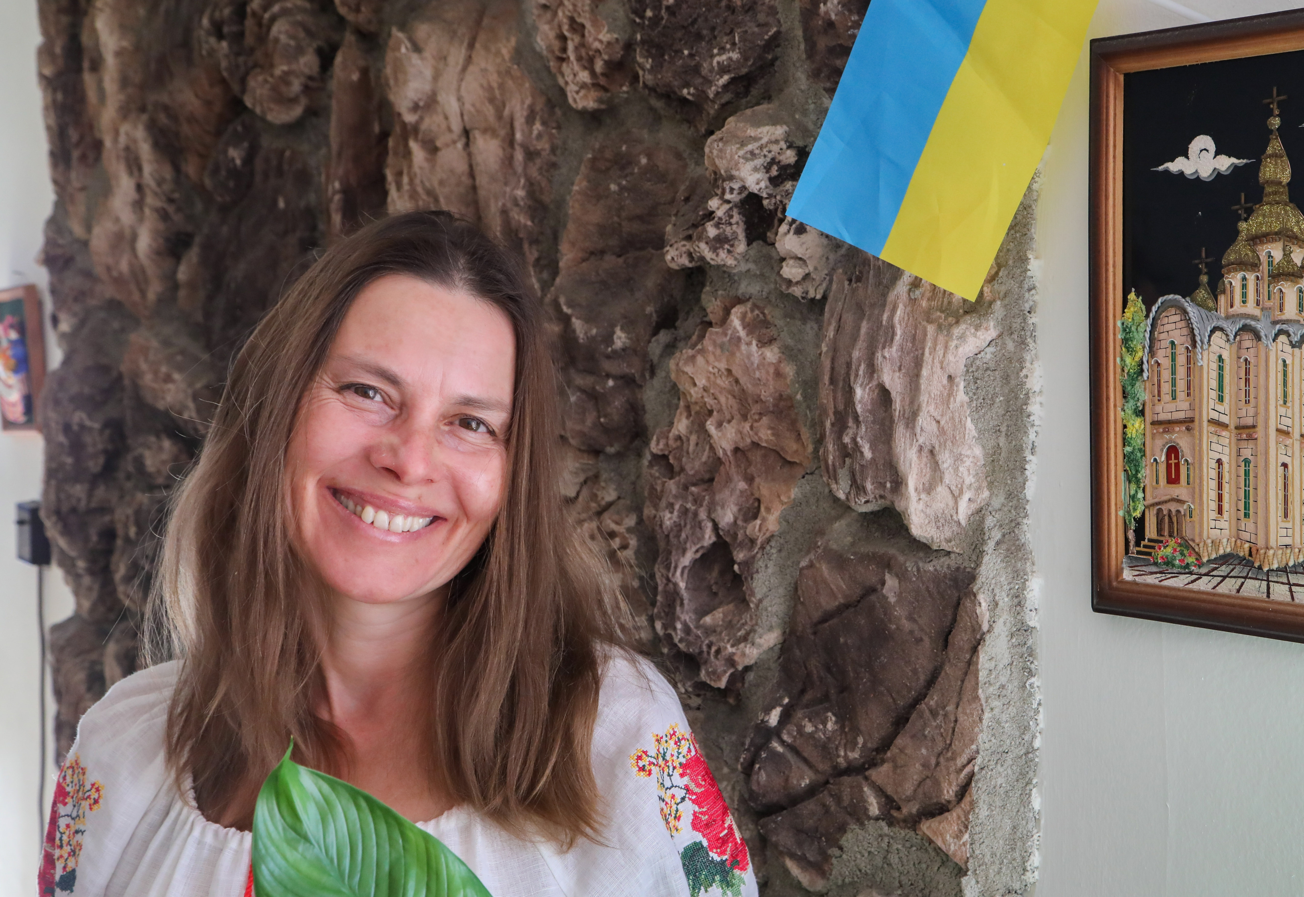 Dr. Ulia Gosart in her Westside home. A San Jose State professor and her team at the university's library sciences division are helping a Ukrainian library digitize their rare book collection and engage children in art to keep a record of the war.