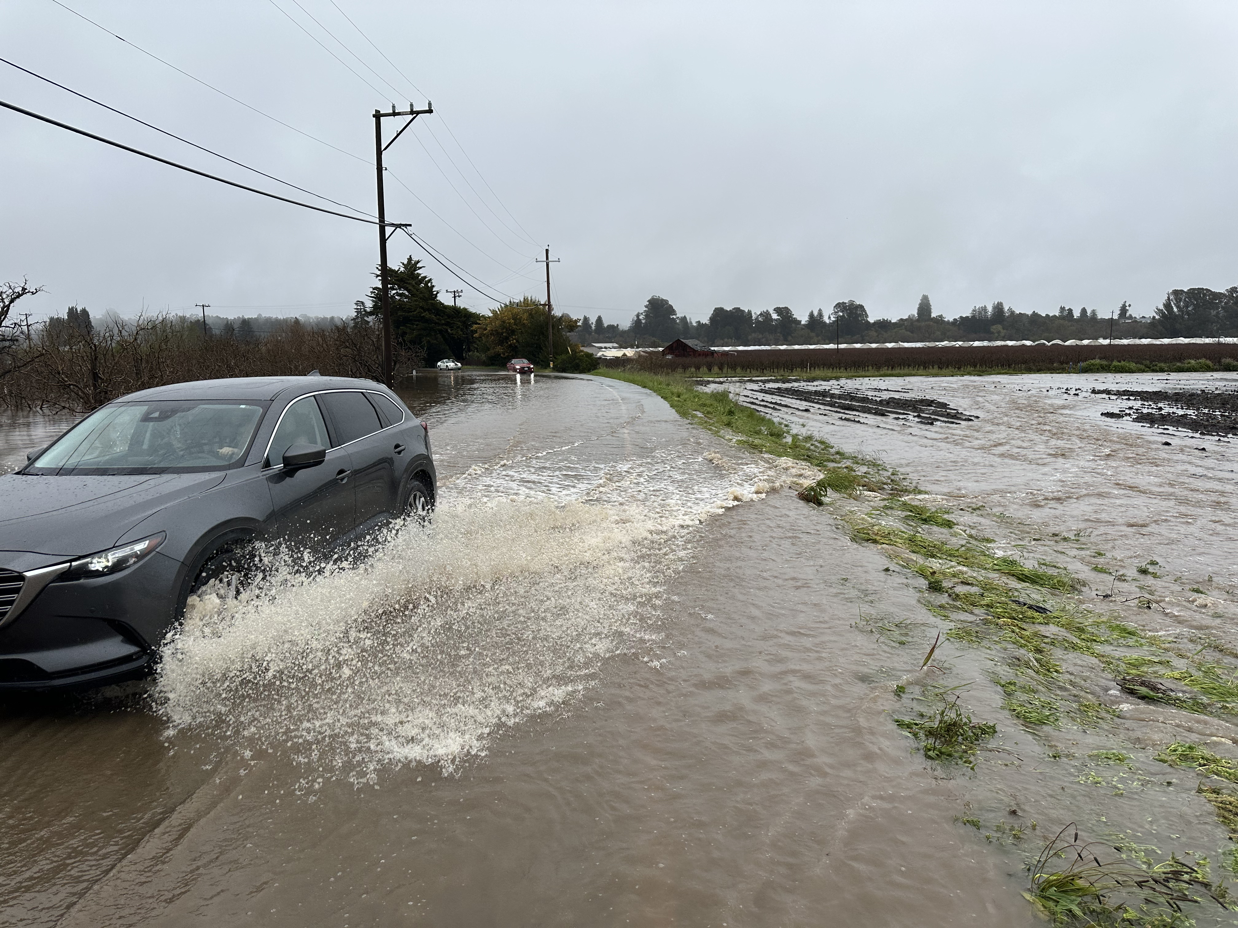 Corralitos Road is under water in Corralitos, Calif. after the latest atmospheric river storm system walloped Santa Cruz County on Thursday evening into Friday morning march 10, 2023.