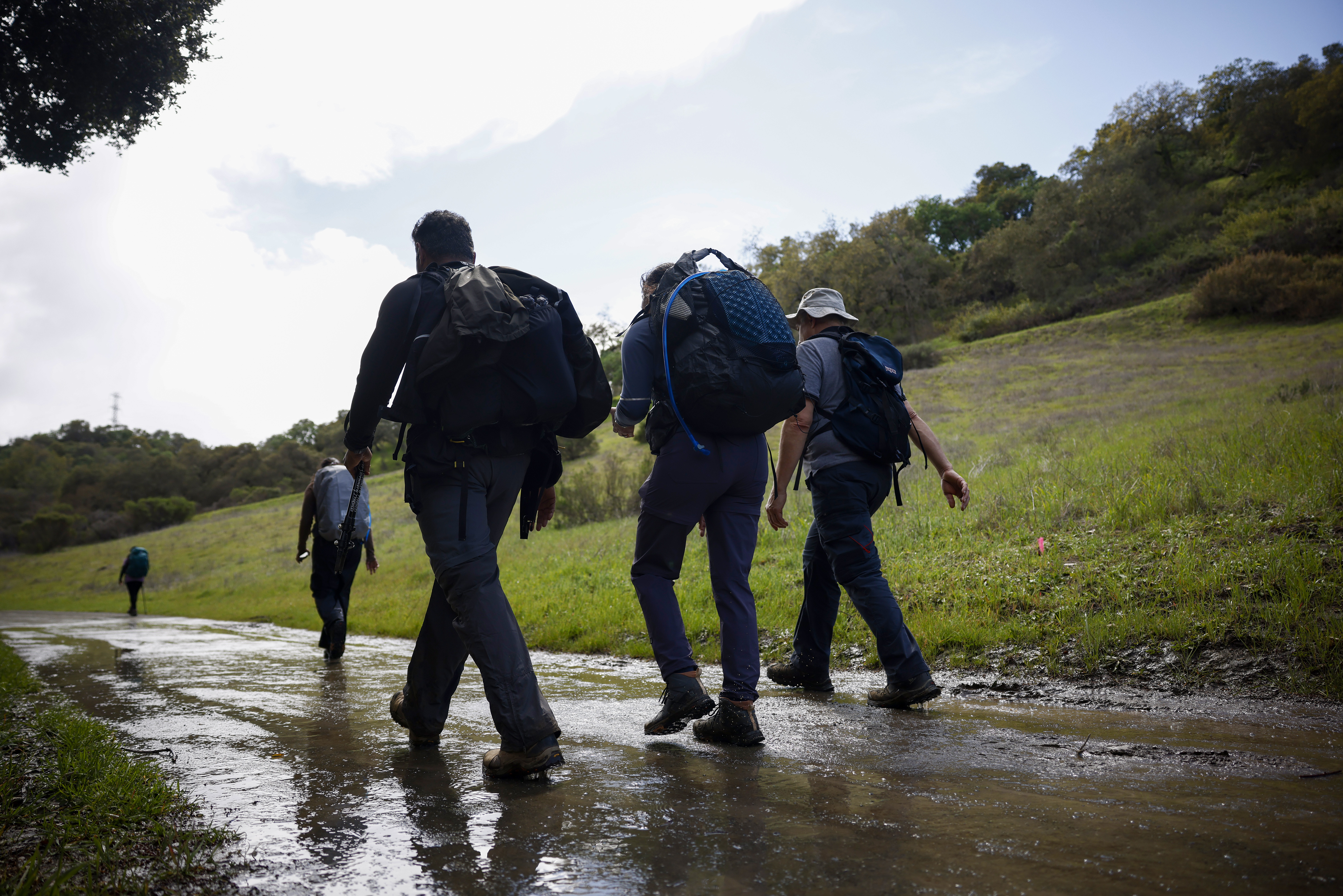 People hike at Rancho San Antonio County Park in Cupertino, Calif., on Sunday, March 5, 2023