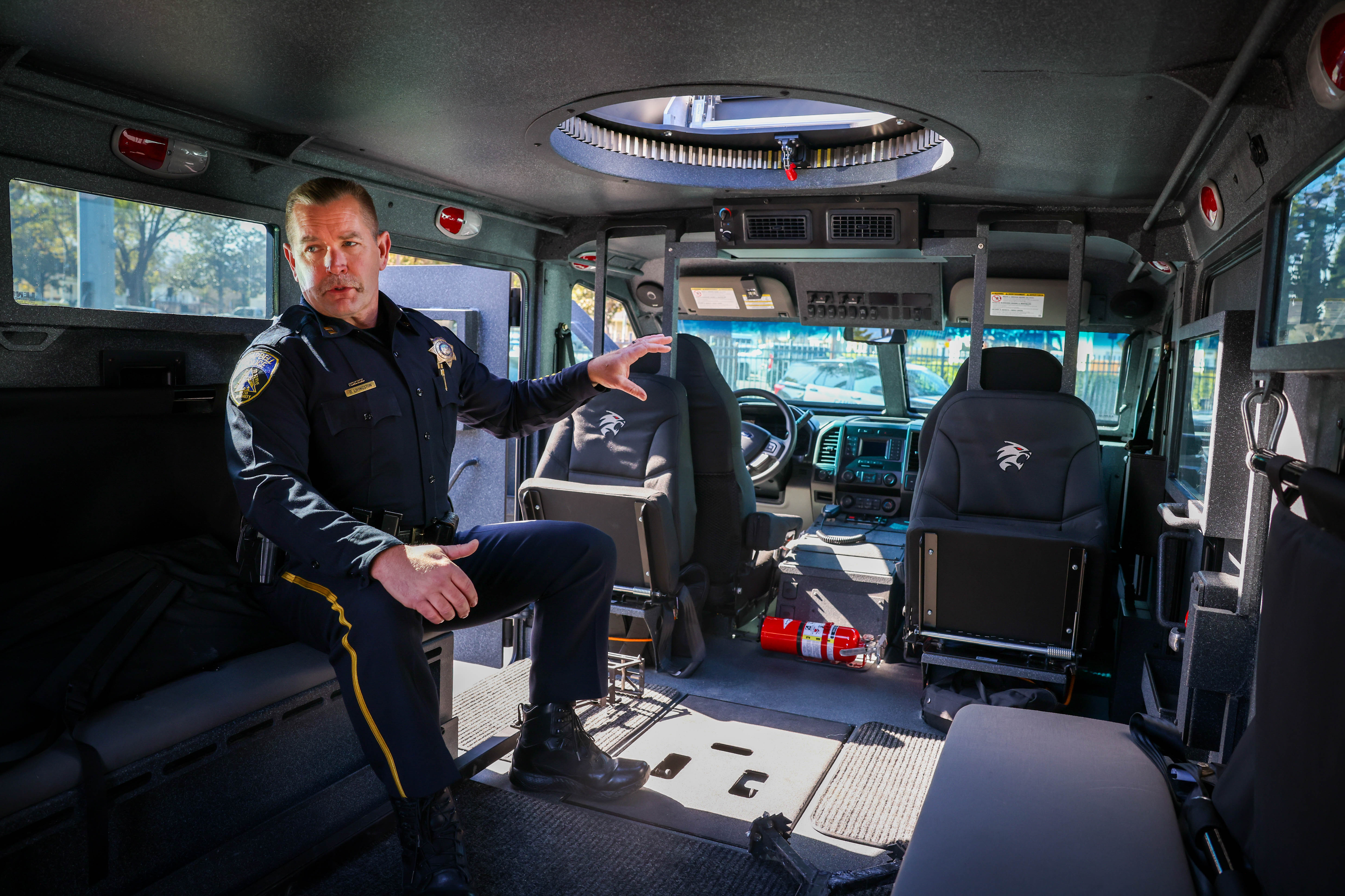 Campbell Police Capt. Dan Livingston shows a BearCat, one of the armored military-grade vehicles they have in inventory at Campbell Police Department in Campbell, Calif., on Friday, Feb. 24, 2023.