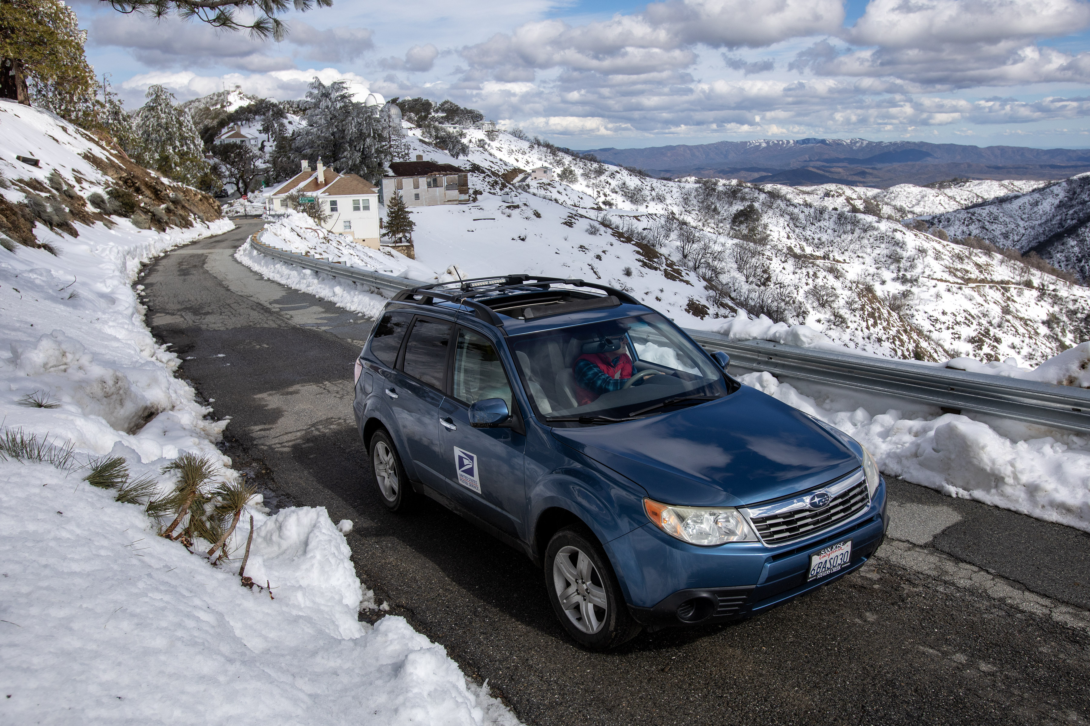 Despite the heavy snowfall, the U.S. Mail is delivered to Lick, Tuesday, March 7, 2023, atop Mount Hamilton. Only one day of service was missed during the past weeks of storms.