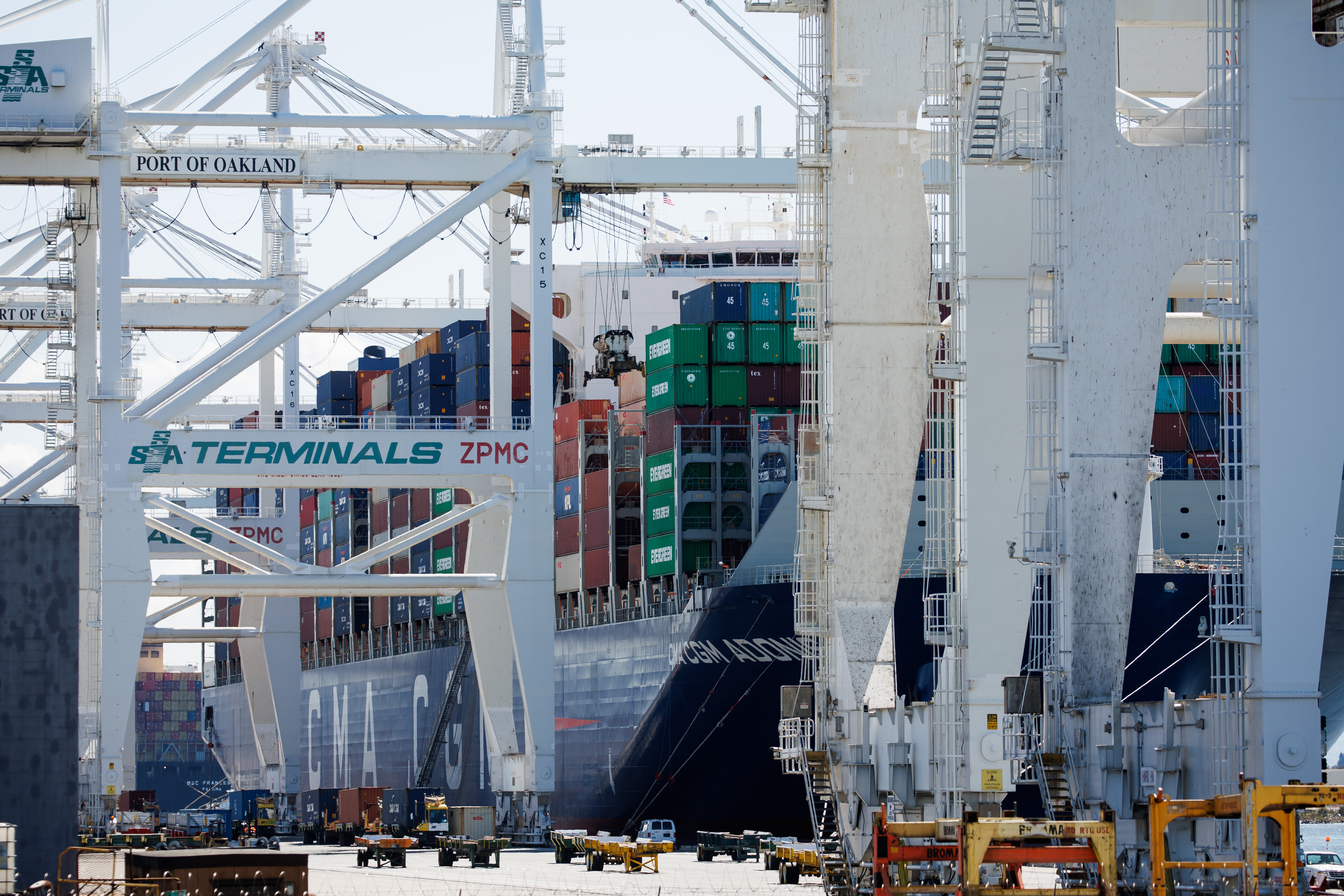 A large container ship is docked at the Port of Oakland in Oakland, Calif., on April 4, 2023.