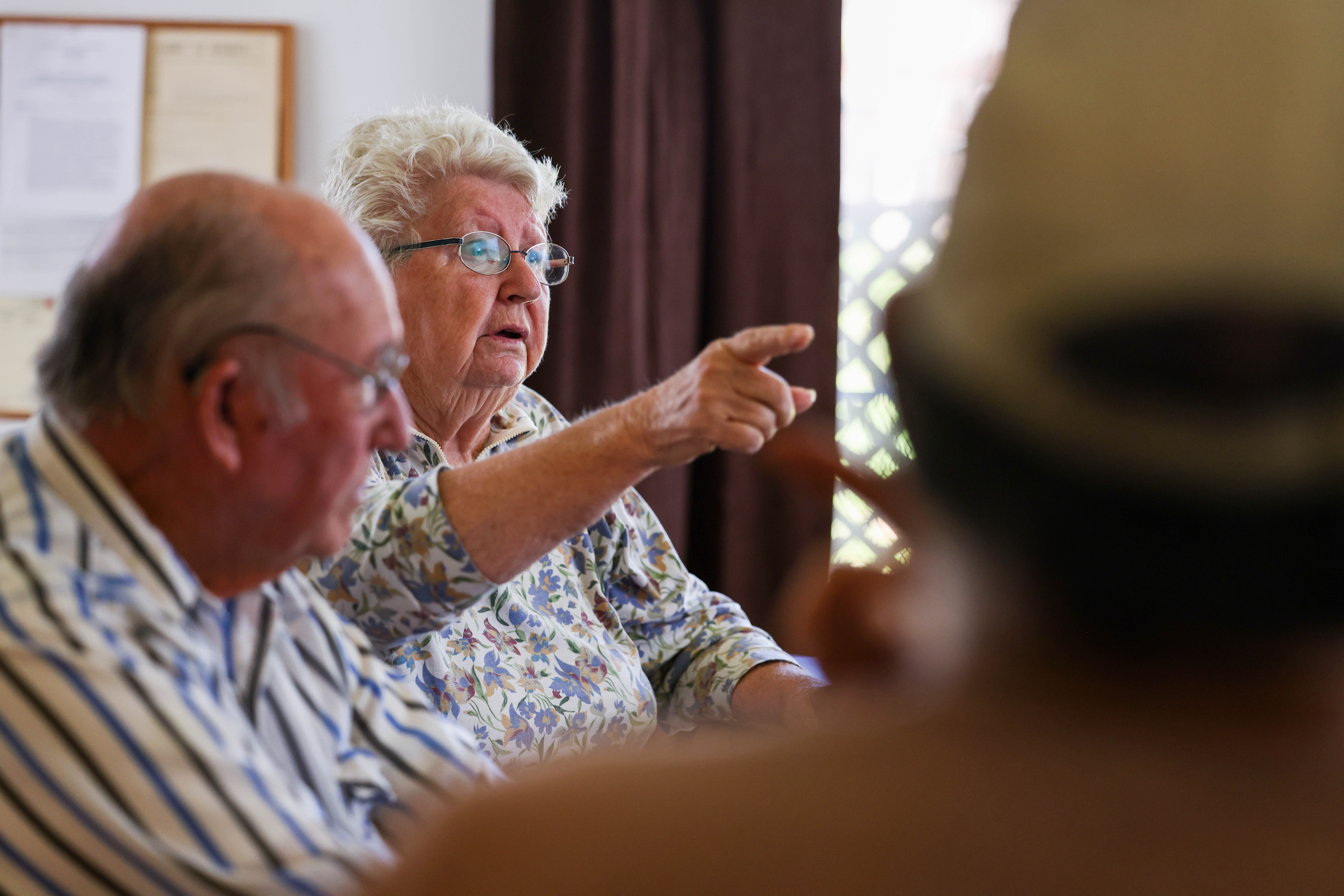 Long-time San Lucas resident Mary Carroll, center, talks about how the town has changed before and after the nitrate contamination in the drinking water in San Lucas, Calif., on Thursday, April 14, 2023