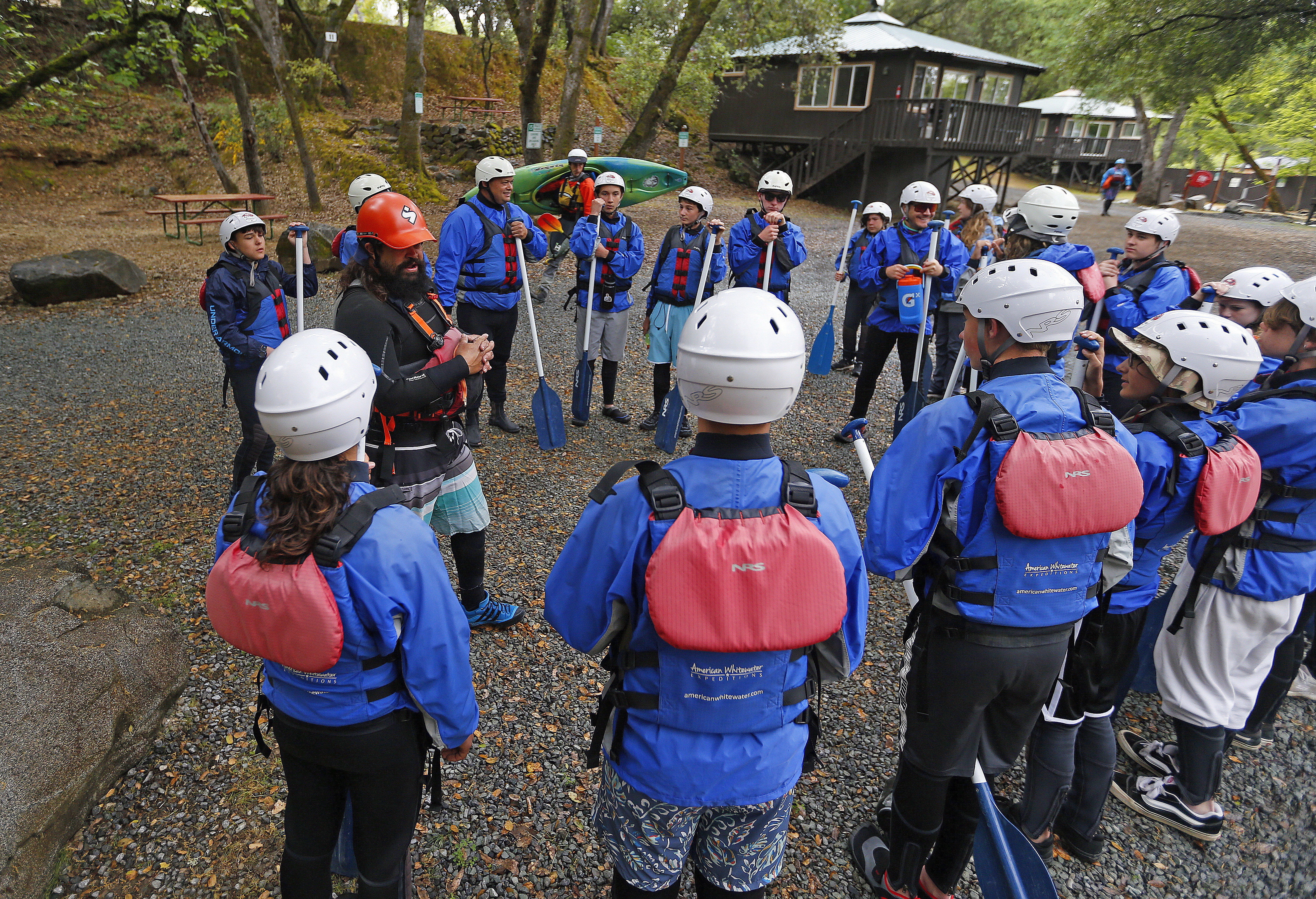 Eighth grade students from Golden Valley Charter School gather for a safety meeting at American Whitewater Expeditions before rafting down the South Fork of the American River on Thursday, May 4, 2023, near Coloma, Calif. (Aric Crabb/Bay Area News Group)