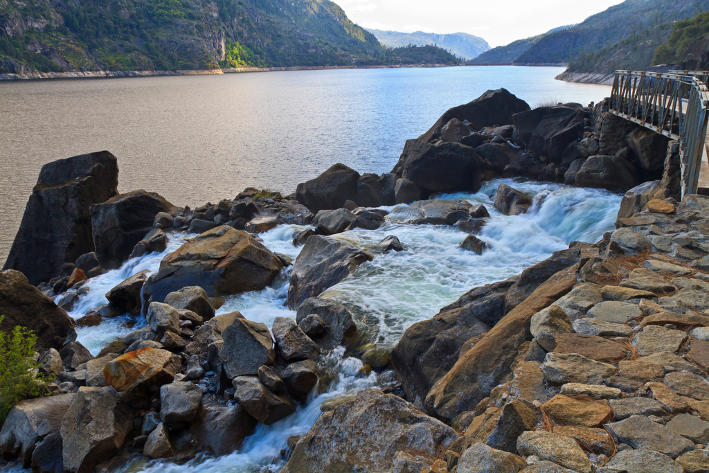 Wapama Falls spills under a footbridge and over boulders before cascading into the Hetch Hetchy Reservoir in Yosemite National Park. (Getty images)