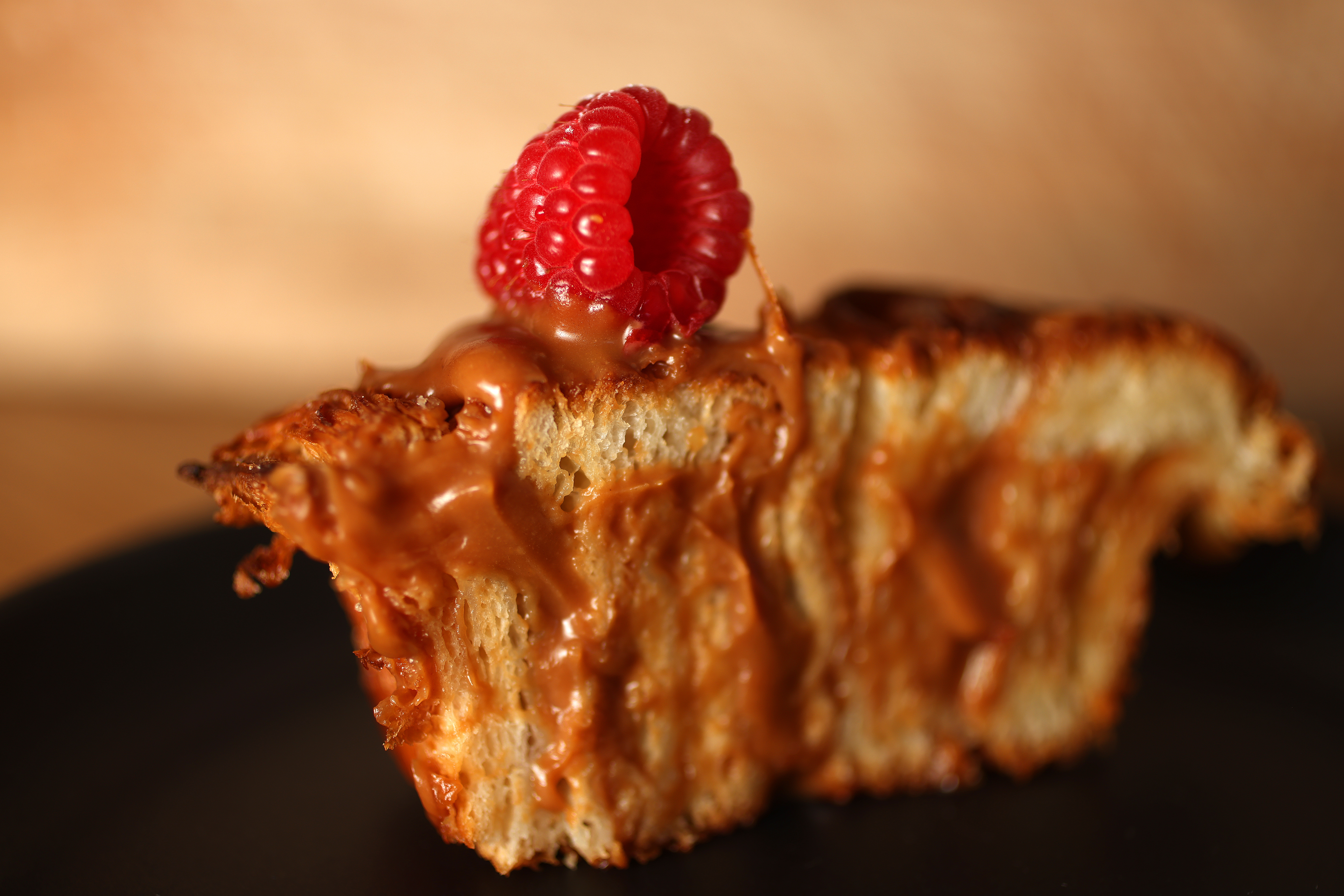 A passionfruit caramel kouign-amann pastry at the Starter Bakery on Wednesday, June 12, 2024, in Oakland, Calif. (Aric Crabb/Bay Area News Group)