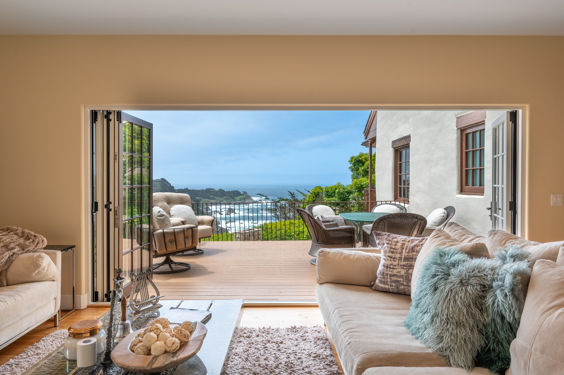 Living room with dramatic views of the ocean.