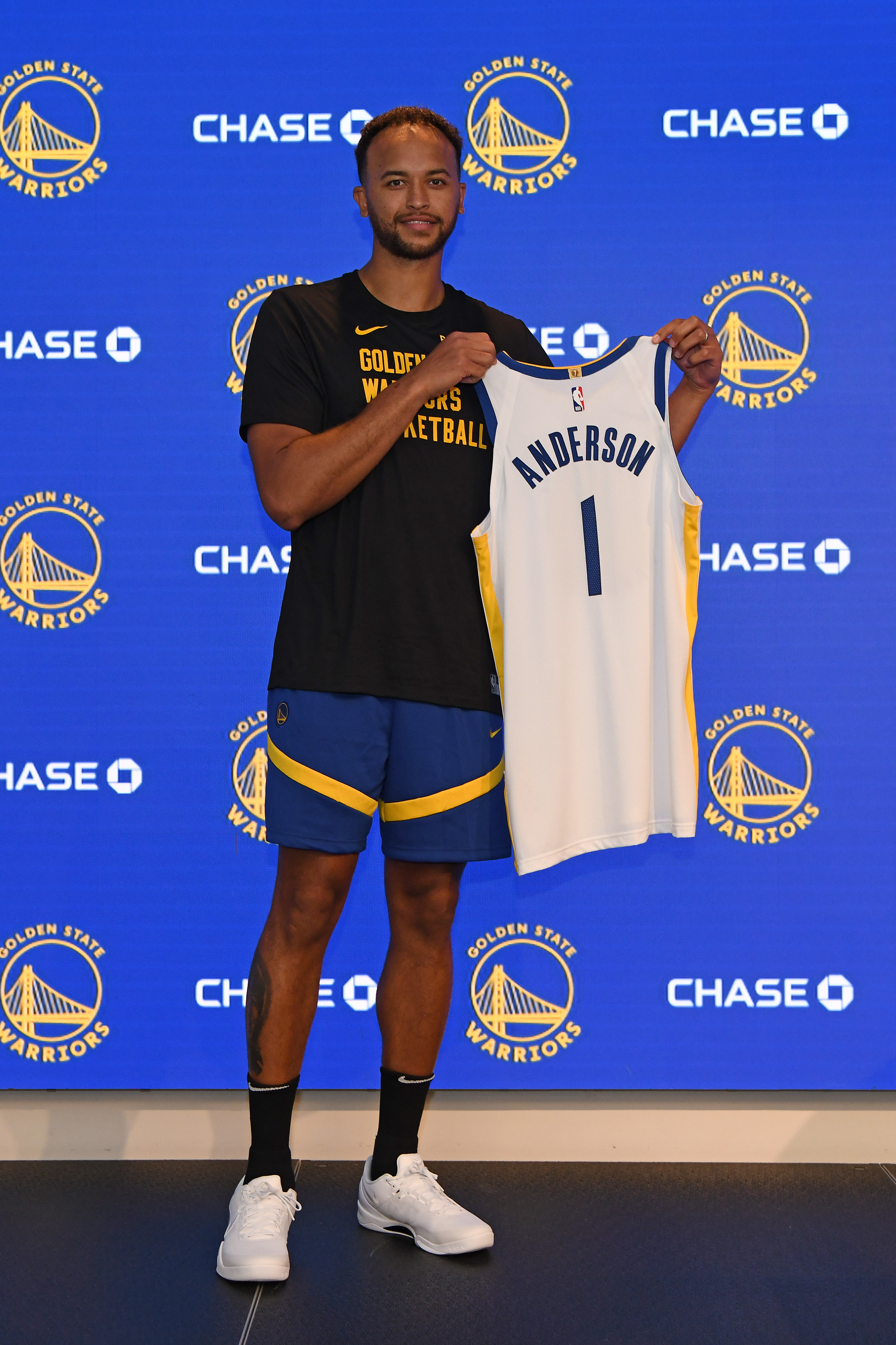 Kyle Anderson holds a Golden State Warriors jersey during a press conference at Chase Center in San Francisco, Calif., on Monday, July 8, 2024. The Warriors have acquired Anderson during the trade for Klay Thompson. (Jose Carlos Fajardo/Bay Area News Group)